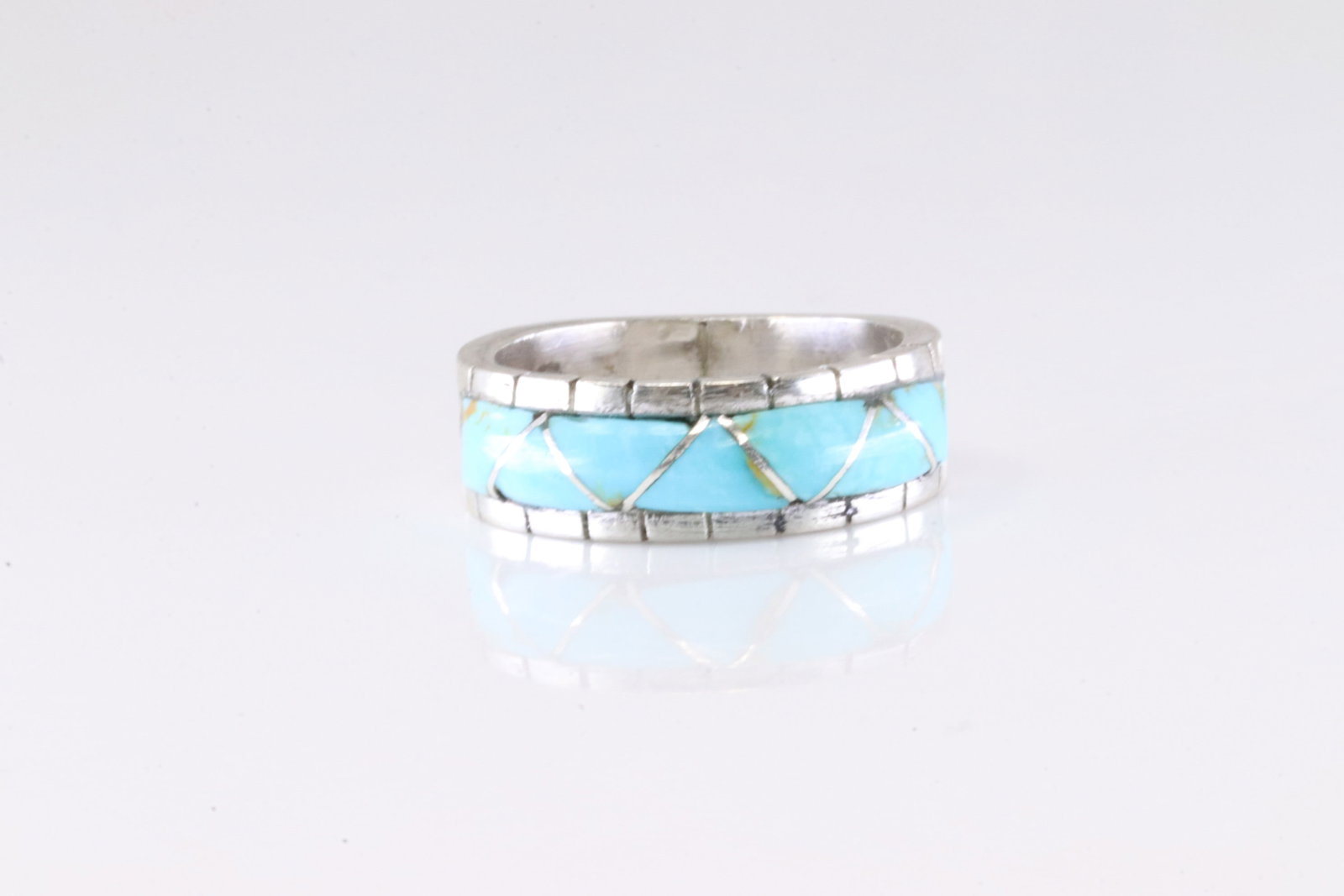 Native America Zuni Sterling Silver Turquoise Inlay Ring By Lucio.: This is a Native America Zuni Sterling Silver Turquoise Inlay Ring By Lucio. Ring size: 8.25.