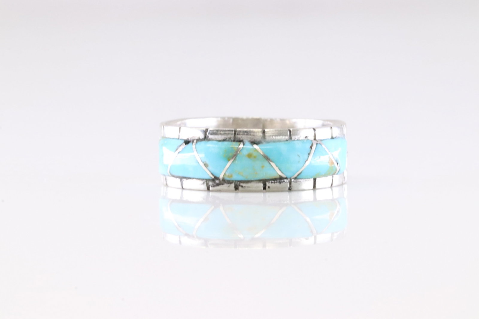 Native America Zuni Sterling Silver Turquoise Inlay Ring By Lucio.: This is a Native America Zuni Sterling Silver Turquoise Inlay Ring By Lucio. Ring size: 9.25.