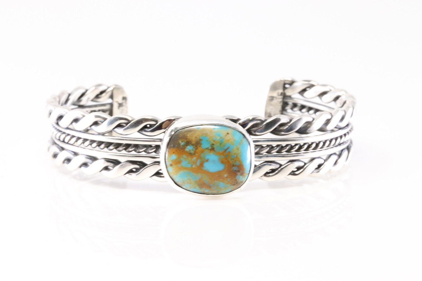 Native America Navajo Sterling Silver Turquoise Bracelet Cuff By Ray Tom.: This is a Native America Navajo Sterling Silver Turquoise Bracelet Cuff By Ray Tom. Stamp Ray Tom.