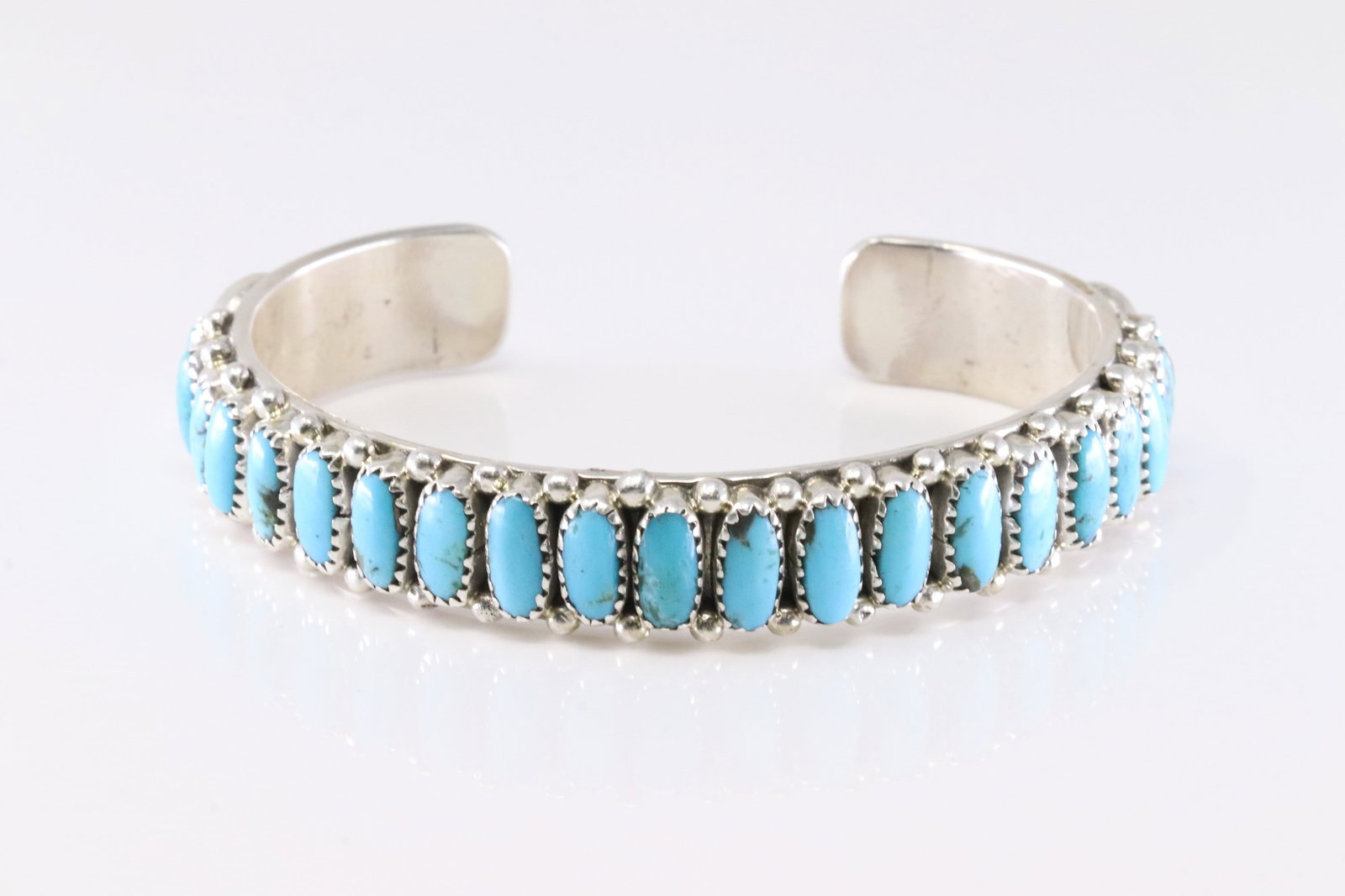 Native America Navajo Sterling Silver Kingman Turquoise Bracelet Cuff By Juspert Wilson.: This is a Native America Navajo Sterling Silver Kingman Turquoise Bracelet Cuff By Juspert Wilson. Stamp J Wilson.