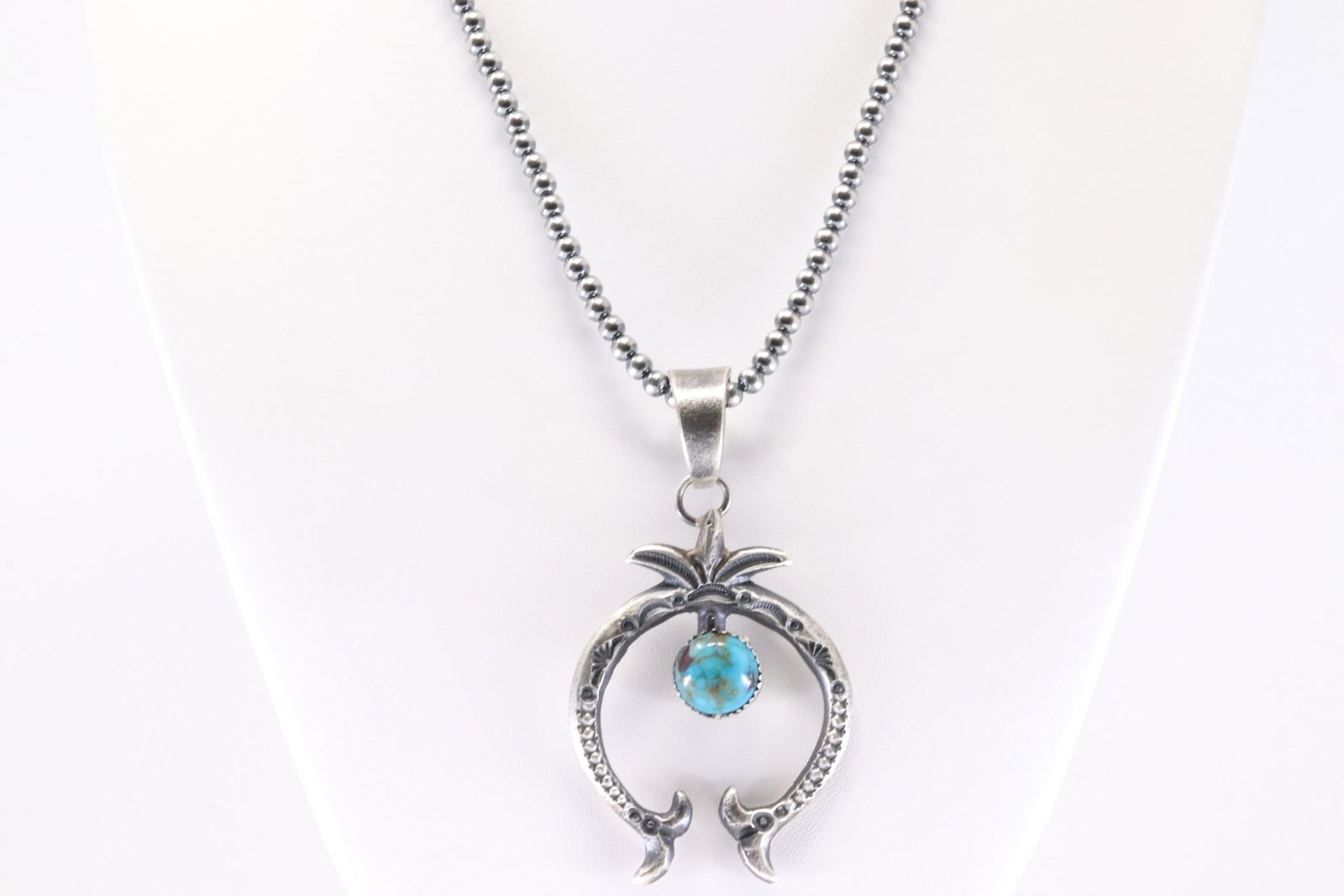Native America Navajo Sterling Silver Turquoise Naja Necklace By E.L. Pearl Beaded Necklace is: This is a Native America Navajo Sterling Silver Turquoise Naja Necklace By E.L. Pearl Beaded Necklace is Machine Made. Necklace length: 16.00"