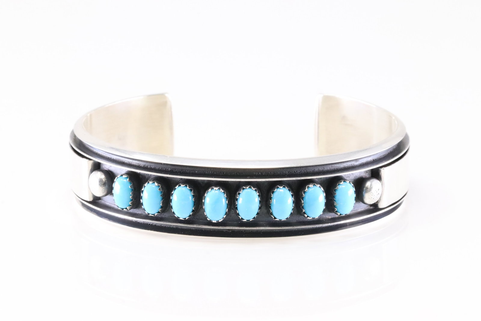 Native America Navajo Sterling Silver Turquoise Bracelet Cuff By Mary James.: This is a Native America Navajo Sterling Silver Turquoise Bracelet Cuff By Mary James. Stamp MJ.