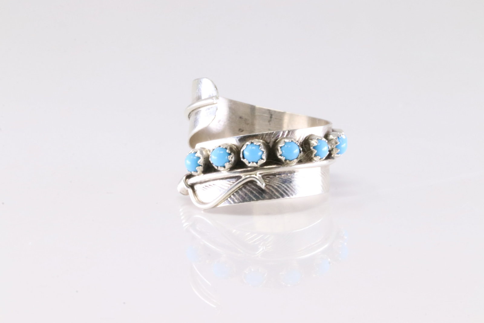 America Sterling Silver Turquoise Feather Ring.: This is a America Sterling Silver Turquoise Feather Ring. Ring size: 8.75.
