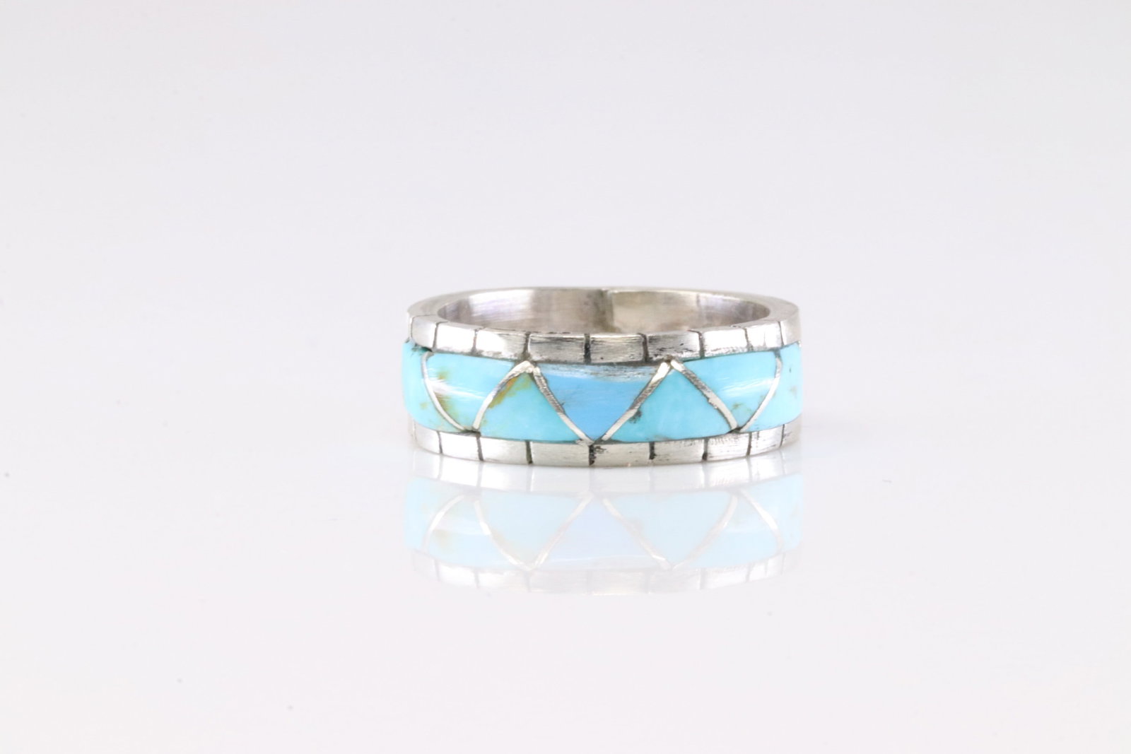 Native America Zuni Sterling Silver Turquoise Inlay Ring By Lucio.: This is a Native America Zuni Sterling Silver Turquoise Inlay Ring By Lucio. Ring size: 8.25.