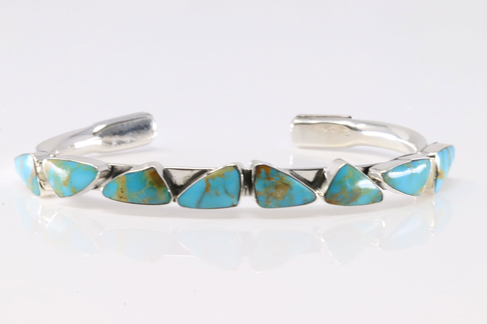 Native America Navajo Sterling Silver Turquoise 8 Stone Bracelet Cuff By Sadie Jim. From R.B: This is a Native America Navajo Sterling Silver Turquoise 8 Stone Bracelet Cuff By Sadie Jim. From R.B Company. Stamp By R.B Company.