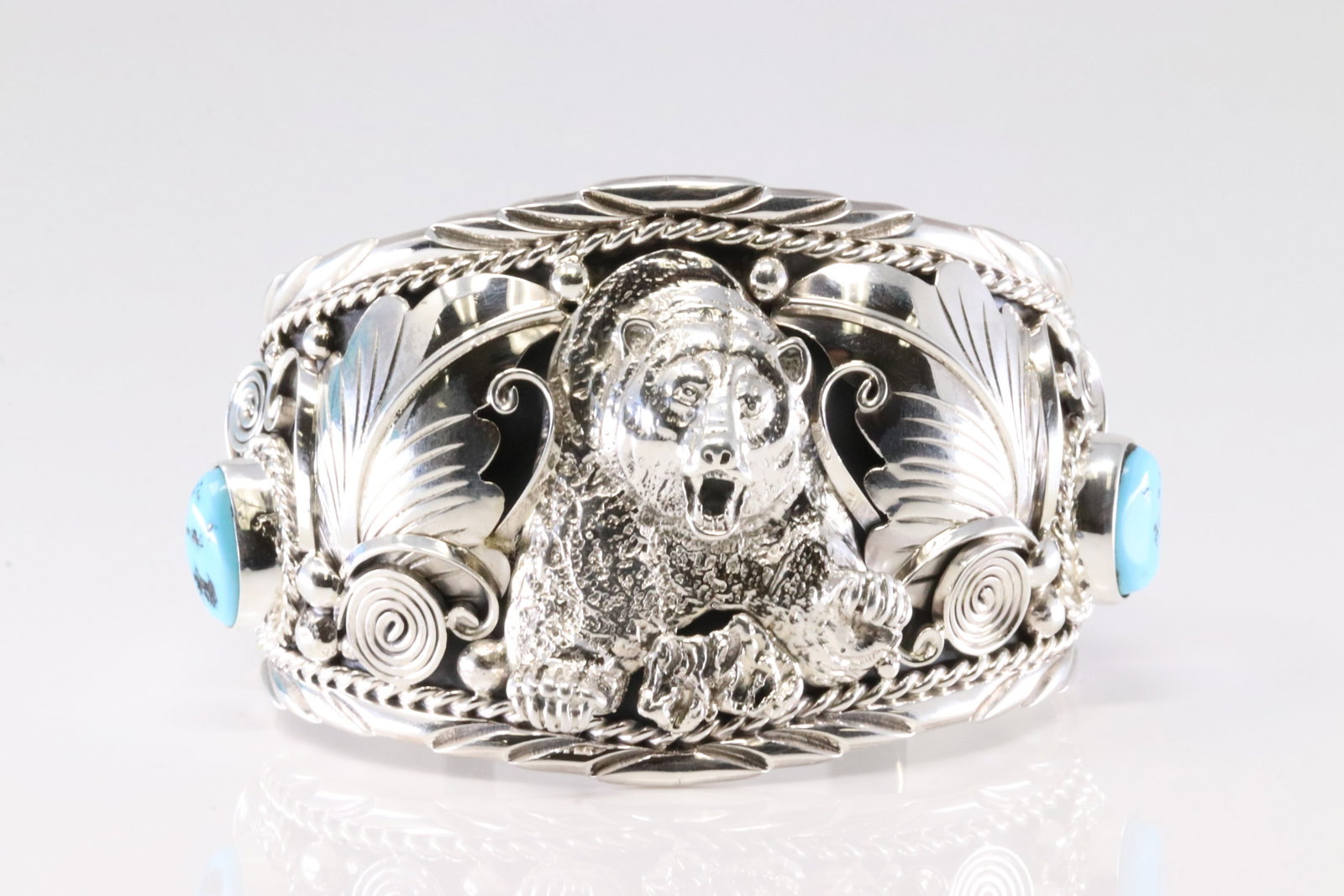 Native America Navajo Sterling Silver Turquoise Bracelet Bear Casted Cuff By Thomas Yazzie. From R.B: This is a Native America Navajo Sterling Silver Turquoise Bracelet Bear Casted Cuff By Thomas Yazzie. From R.B Company. Stamp By R.B Company. Total Weight: 85.65 Grams.