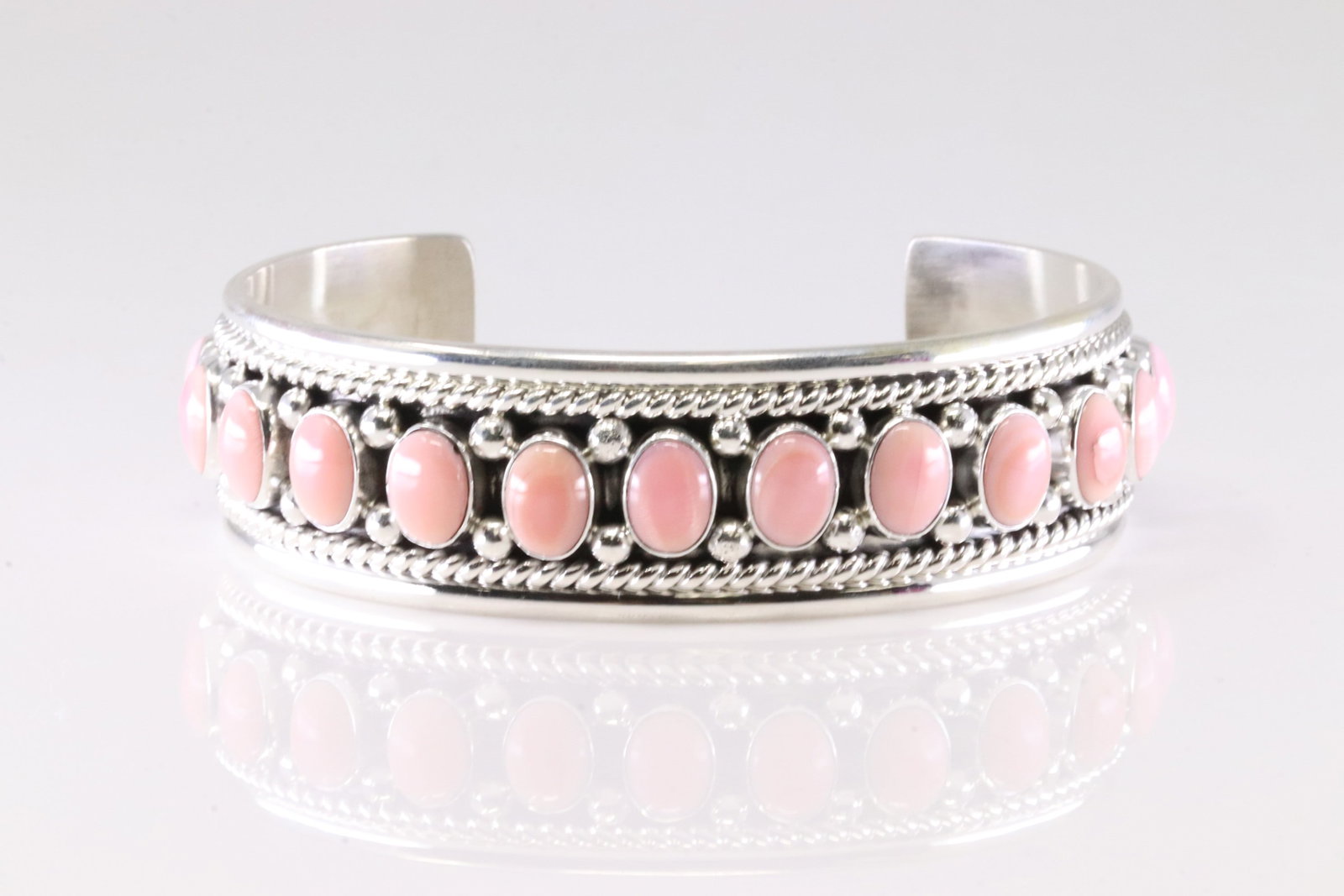Native America Navajo Sterling Silver Pink Conch Shell Bracelet Cuff By C.Charley.: This is a Native America Navajo Sterling Silver Pink Conch Shell Bracelet Cuff By C.Charley.