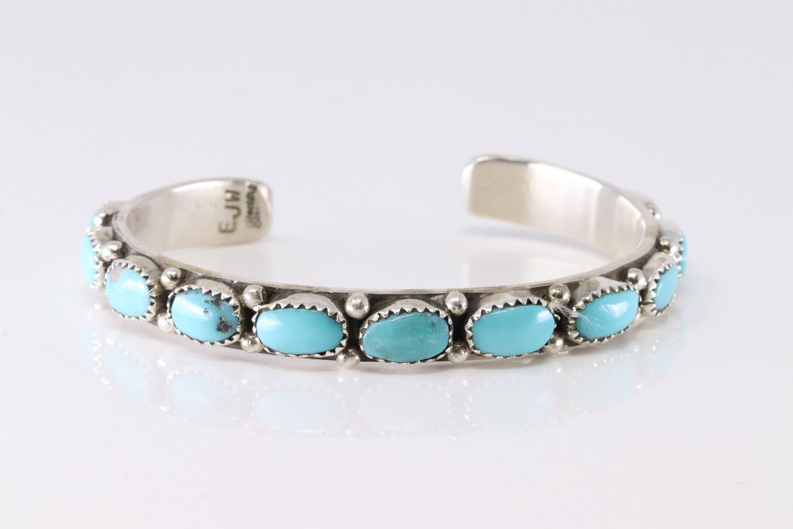 Native America Zuni Sterling Silver Turquoise Bracelet Cuff By Eunis Tso.: This is a Native America Zuni Sterling Silver Turquoise Bracelet Cuff By Eunis Tso. Stamp EJW.