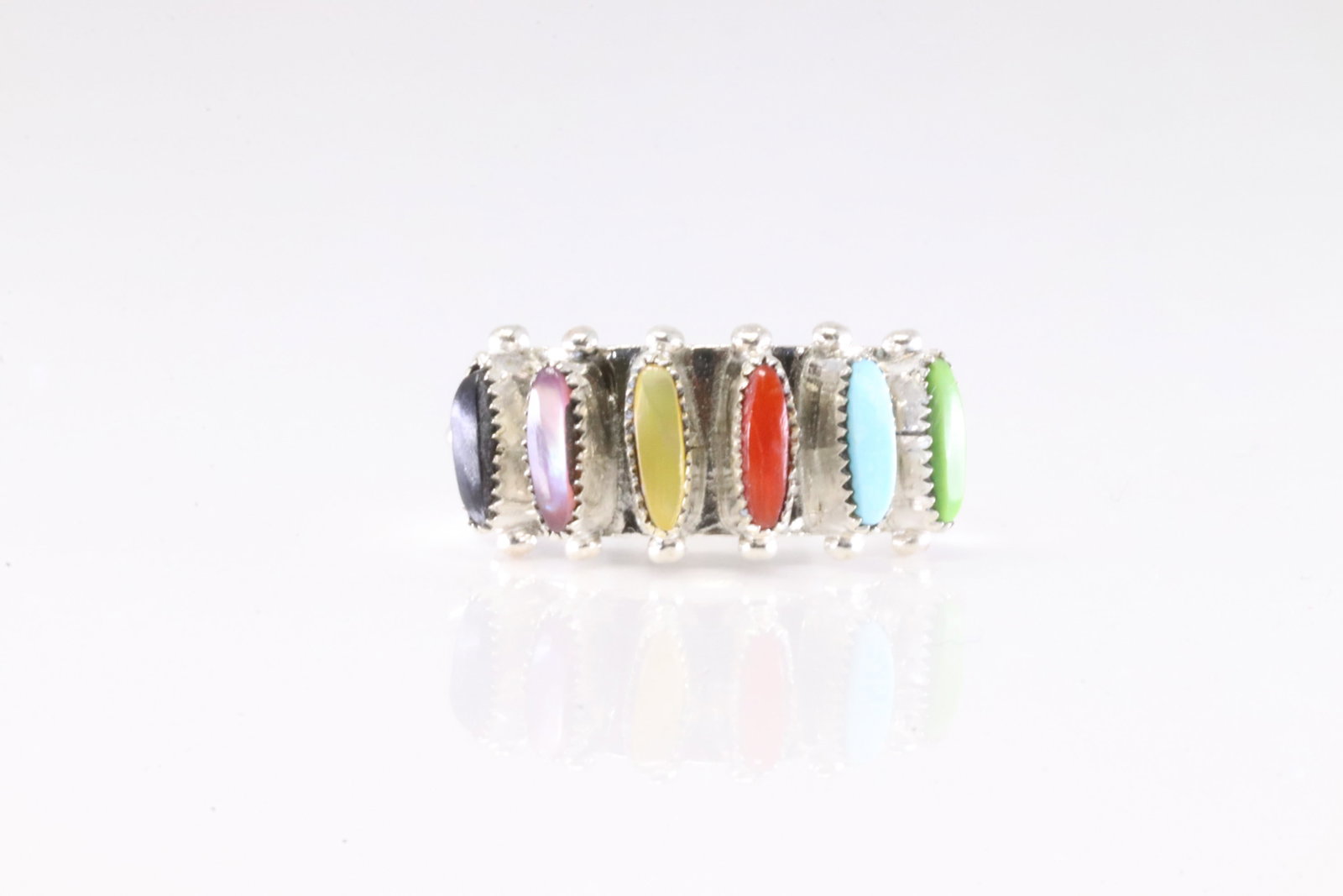 Native America Zuni Sterling Silver Multi-Color Stone Ring By Paloma.: This is a Native America Zuni Sterling Silver Multi-Color Stone Ring By Paloma. Ring size: 7.50.