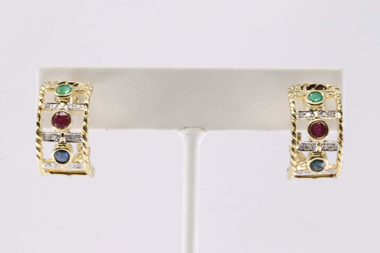 Multi-Color Gemstone & Diamond Hoop Earring 14Kt.: Ladies 14Kt Yellow Gold Multi-Color Gemstone & Diamond Hoop Earring. This Charming Hoop Earring's has Sapphire/ Ruby/Emerald & Diamonds. Total weight: 10.04 Grams.