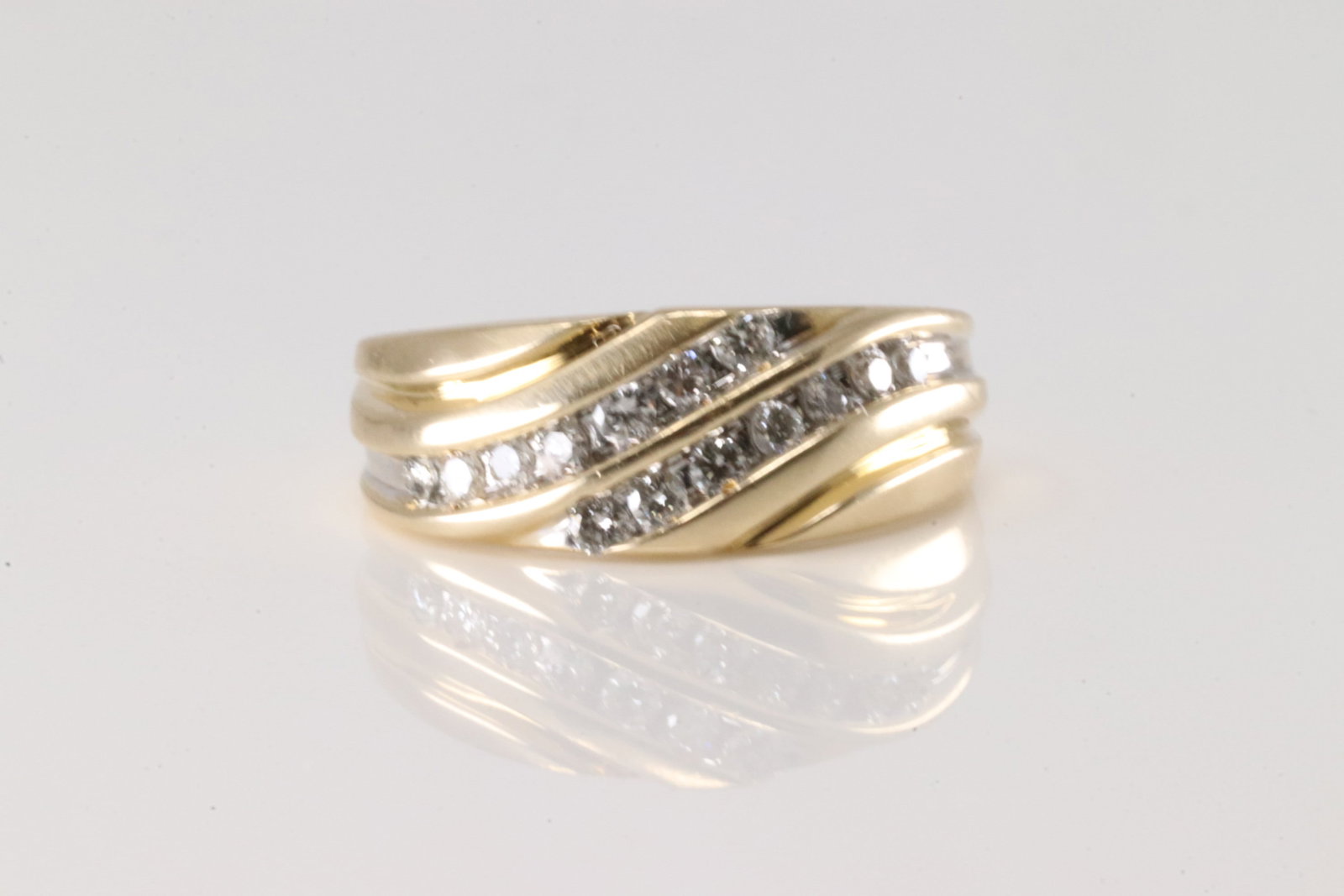 Wedding Diamond Ring 14Kt.: 14Kt Yellow Gold wedding Diamond Ring. This elegant wedding ring has 2 rows with 14 sparkling diamonds. Diamonds weight approx: 0.50 ctw Ring size: 9.00. Total weight: 7.80 Grams.
