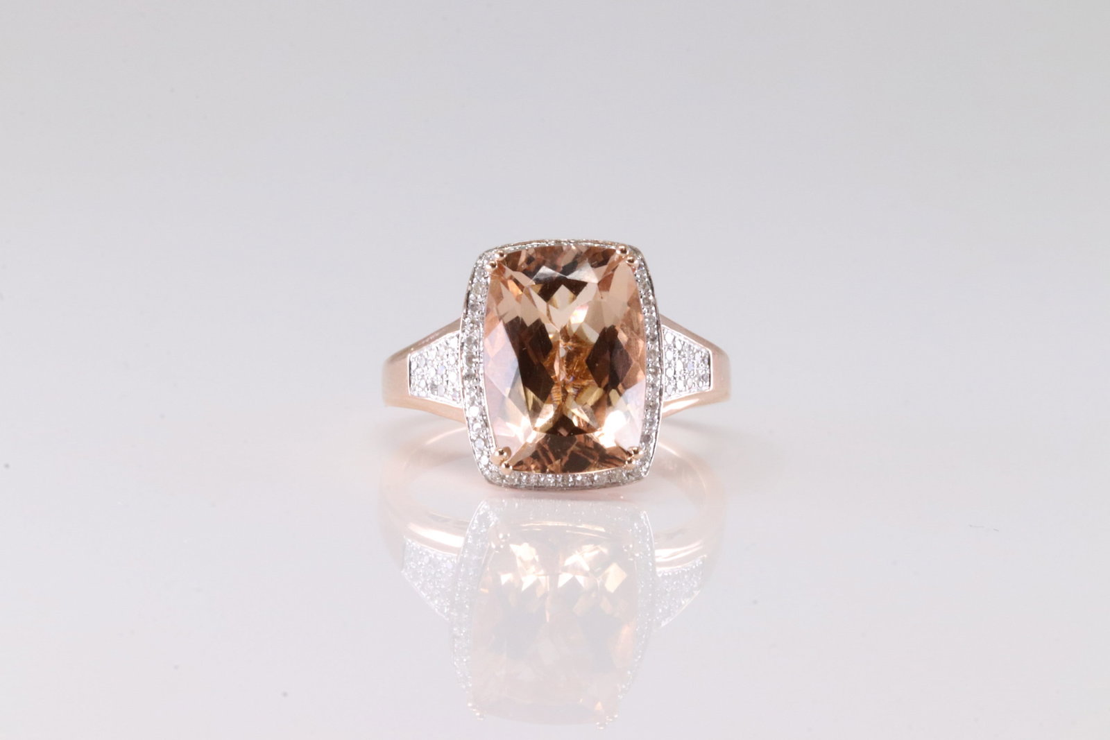 Morganite & Diamond Ring 14Kt.: Ladies 14Kt Rose Gold Morganite & Diamond Ring. This Ring has Gorgeous Morganite Gemstone With 70 Round Sparkling Diamonds. Ring Size: 9.00. Total Weight: 6.50 Grams.
