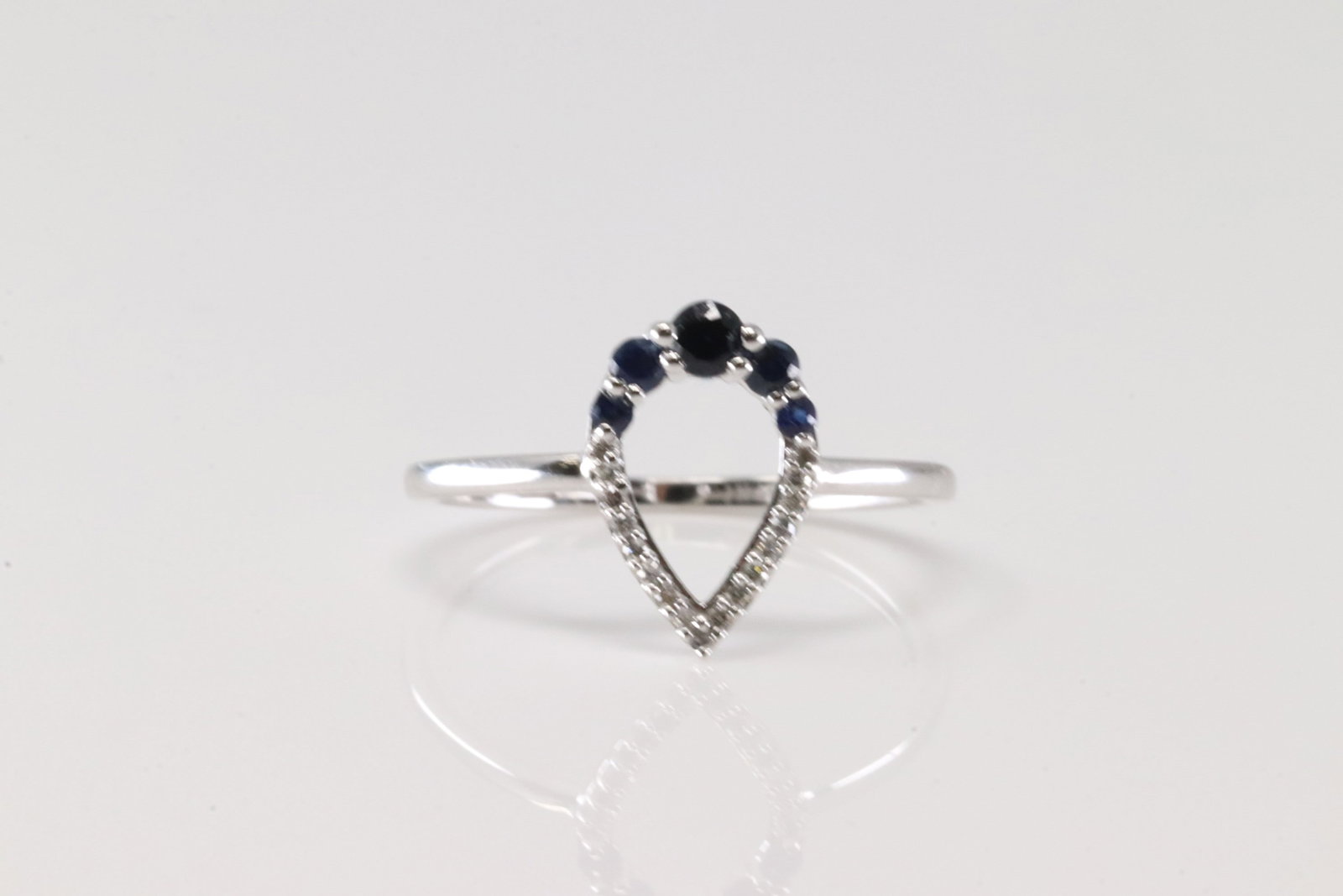 Sapphire & Diamond Ring 14Kt.: Ladies 14Kt White Gold Diamond & Sapphire Ring. This Ring has Pear-Shaped with Sapphires and Sparkling Diamonds. Diamonds weight: 0.29ctw. Ring size: 6.50.