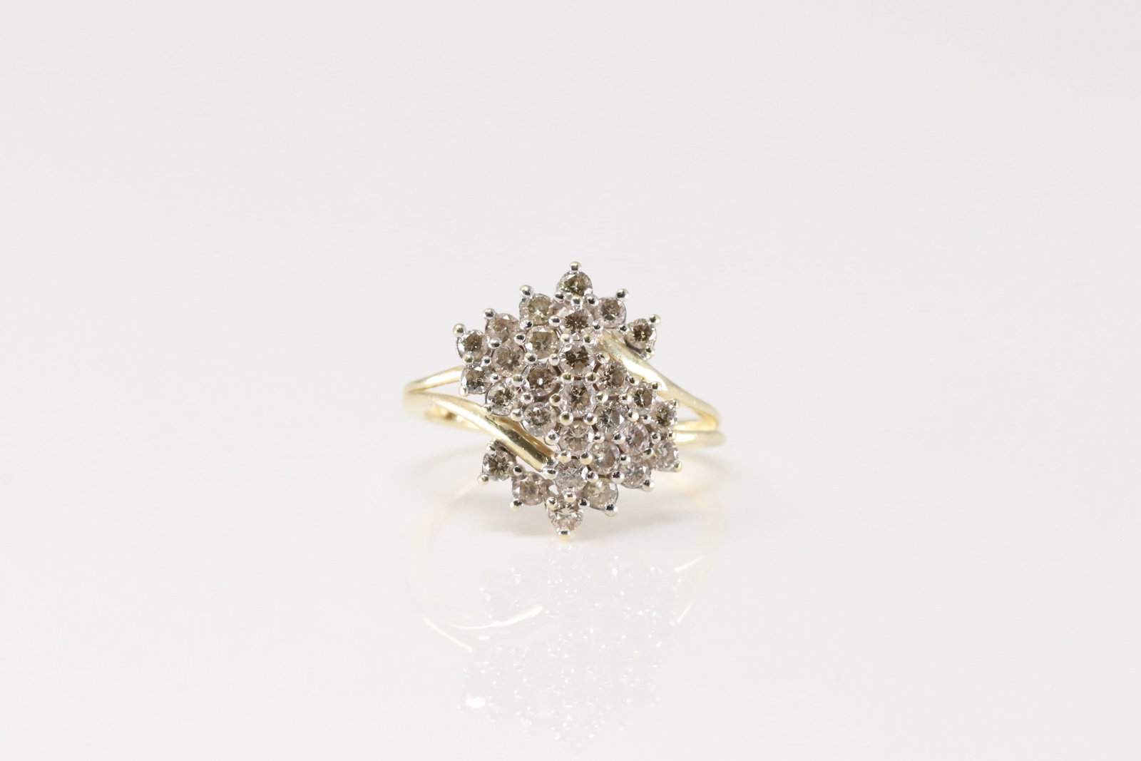 Champagne Diamond Ring 10Kt.: Ladies 10Kt Yellow Gold Champagne Diamond Ring. This Elegant Ring has Letter S Design with 29 Sparkling Champagne Diamonds. Diamond weight approx: 1.00ctw. Ring size: 6.50. Total weight: 2.70 Grams.