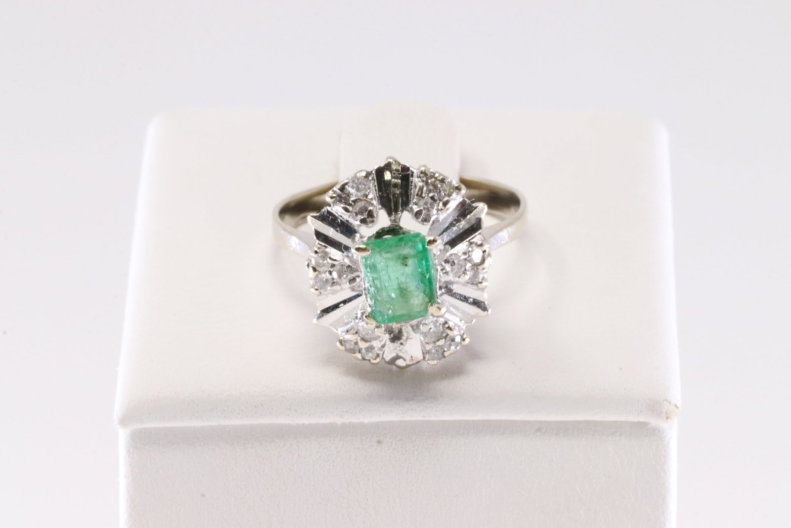 Emerald & Diamond Ring 18Kt.: Ladies 18Kt White Gold Emerald & Diamond Ring. This Elegant Ring has Green Emerald Surrender By Sparkling Diamonds. Ring size: 6.50. Total weight: 3.52 Grams.