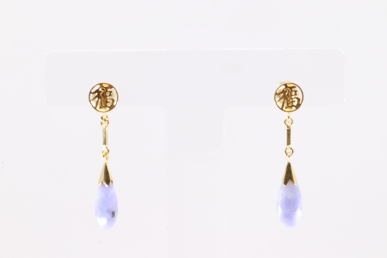 Blue Chalcedony Stud Earring 14Kt.: Ladies 14Kt Yellow Gold Blue Chalcedony Stud Earring. This Gorgeous Earring's has Blue Chalcedony Oval Gemtones.