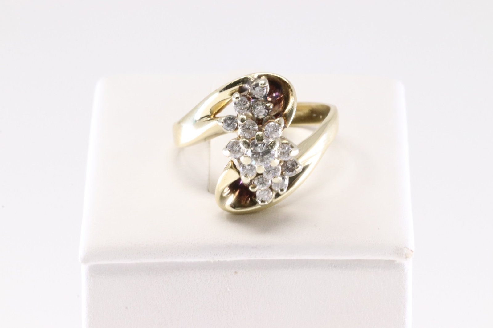 Diamond Ring 14Kt.: Ladies 14Kt Yellow Gold Diamond Ring. This Elegant Ring has 15 Brilliants Diamonds. Ring size: 7.75. Total weight: 6.45 Grams. Diamonds weight approx 0.75ctw.