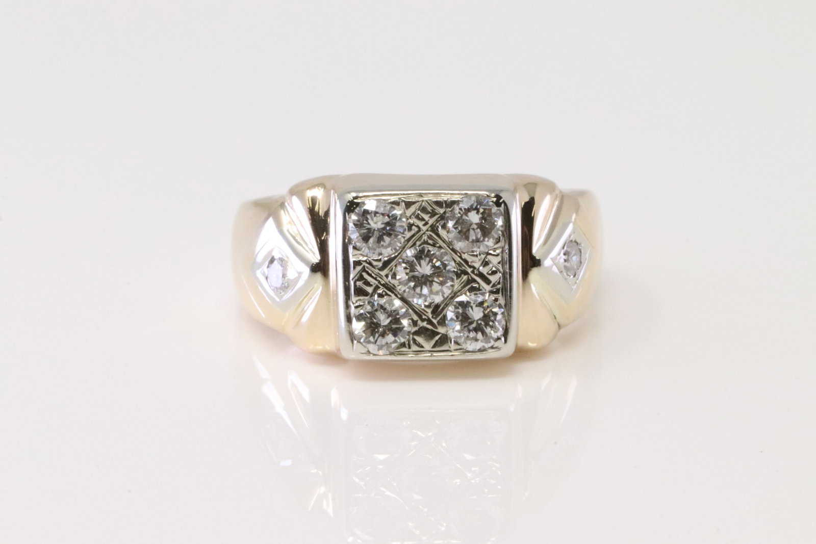 Diamond Ring 14Kt.: 14Kt Yellow Gold Diamond Ring. Ring has 7 round Diamonds. Diamonds weight: 0.50ctw. Ring size: 9.25. Total weight: 7.60 Grams.