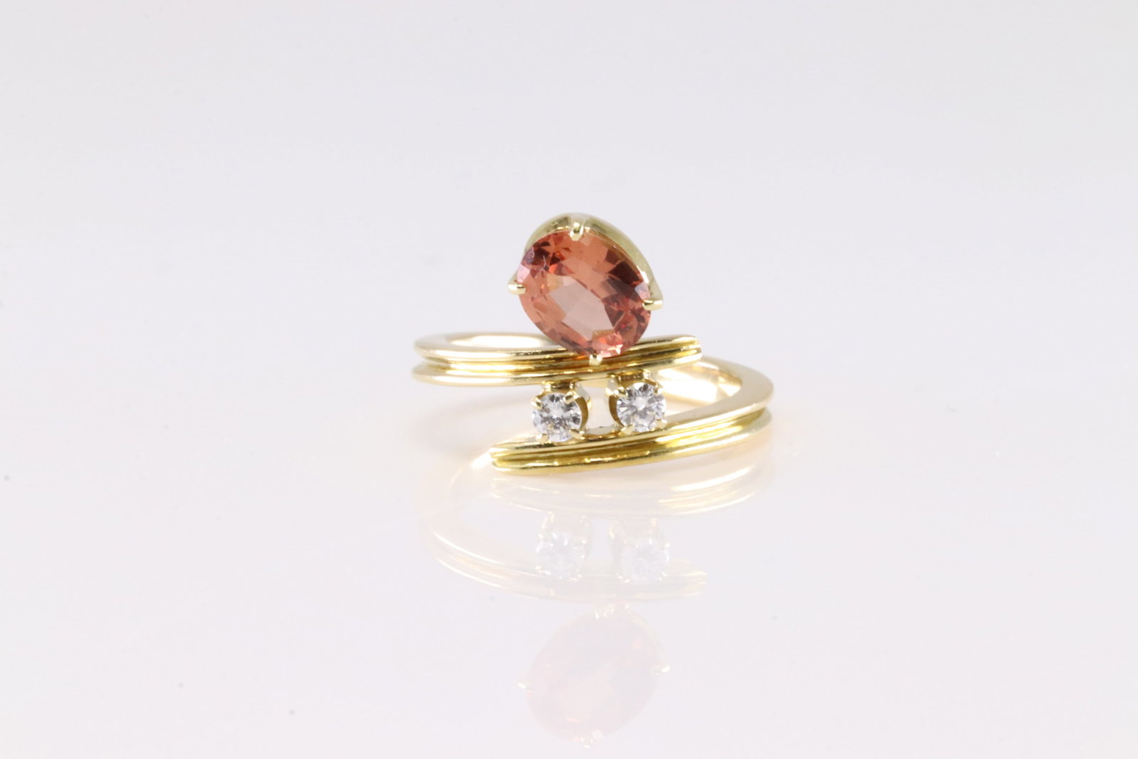Sapphire & Diamond Ring 18Kt.: Ladies 18Kt Yellow Gold sapphire & Diamond Ring. This Charming Ring has Morganite Gemstone with 2 Brilliants Diamonds. Diamonds weight approx: Ring size: 4.25 Grams.