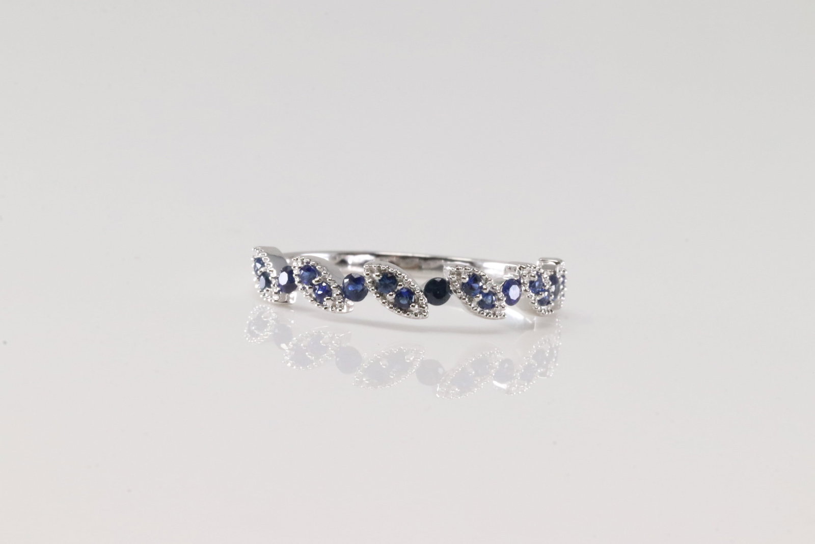Sapphire Ring 10Kt.: ladies 10Kt White Gold Sapphire Ring. This Charming Ring has round Blue Sapphires. Ring size: 7.00.