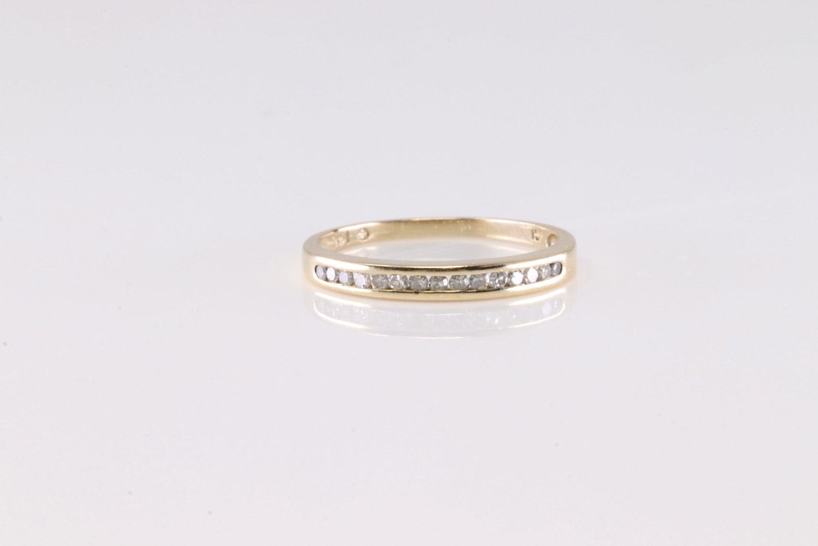 Diamond Ring 14Kt.: Ladies 14Kt Yellow Gold Diamond Ring. This Charming Band Ring has Sparkling Diamonds.: Ring size: 5.75.