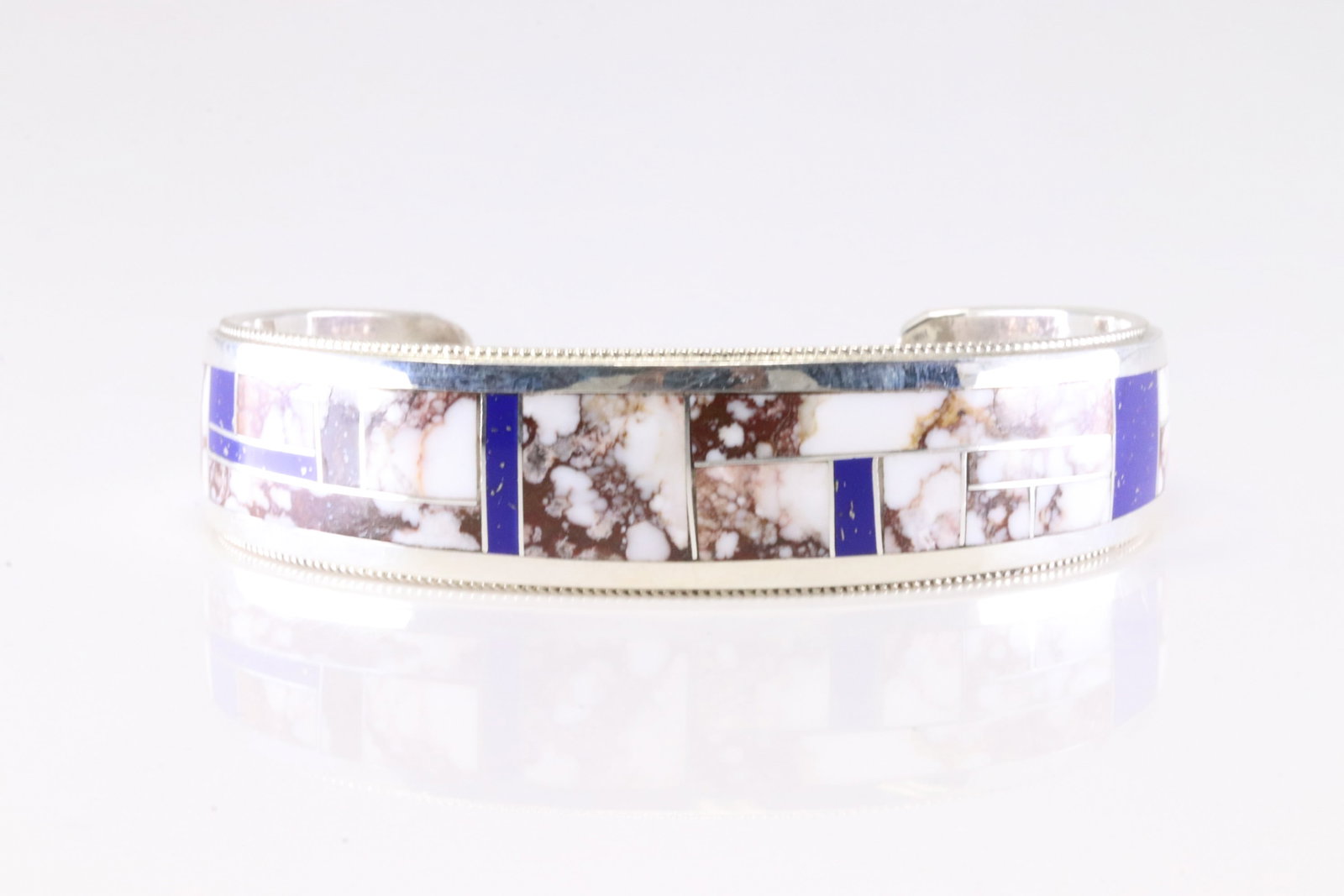 Native America Zuni Sterling Silver Wild Horse & Lapis Inlay Bracelet Cuff By RGB.: This is a Native America Zuni Sterling Silver Wild Horse & Lapis Inlay Bracelet Cuff By RGB.