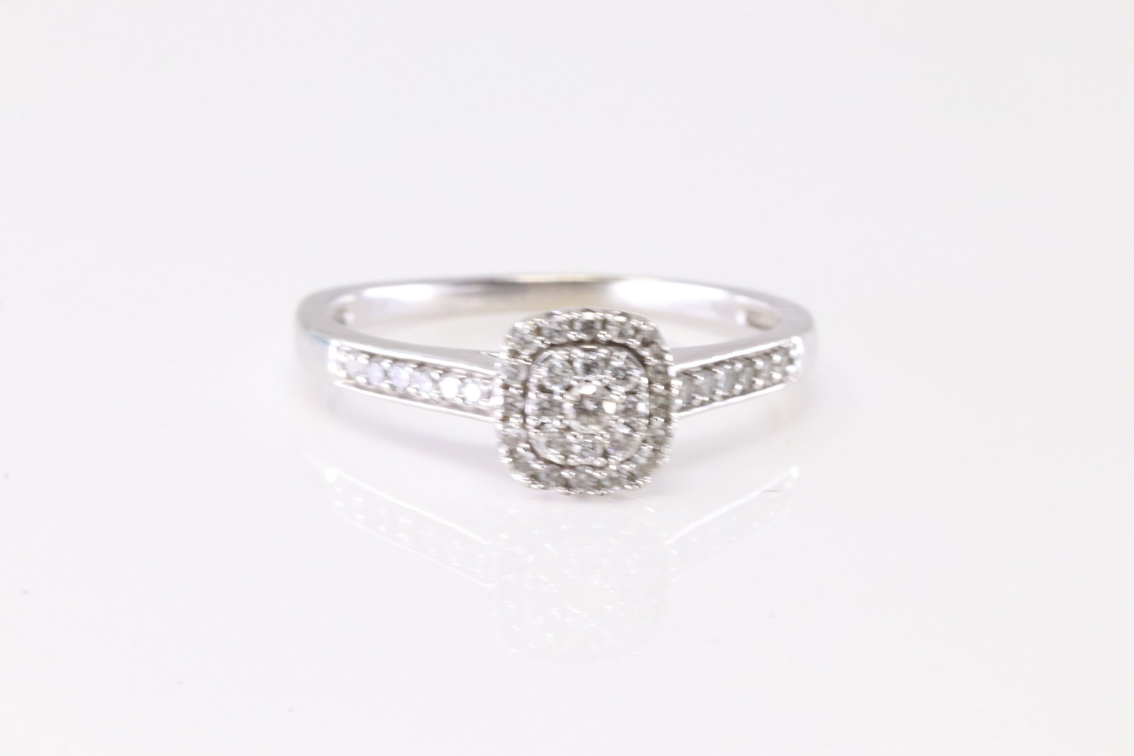 Diamond Ring 10Kt.: Ladies White Gold Diamond Ring. This Charming Ring has 37 Round Sparkling Diamonds Ring Size: 7.00. Total Weight: 2.00 Grams.