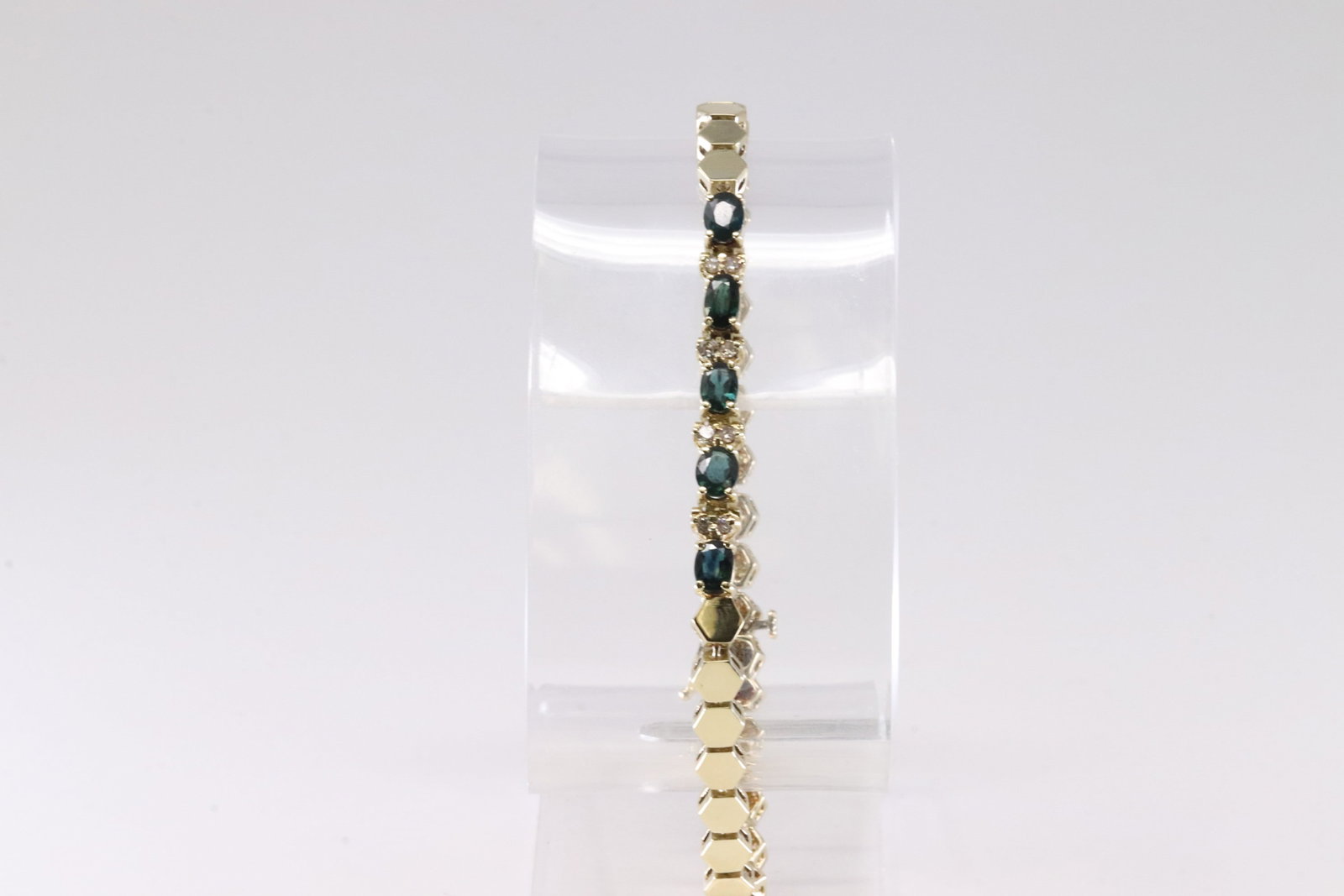Elegant Sapphire & Diamond Bracelet 14Kt.: 14Kt Yellow Gold Sapphire & Diamond Bracelet. This Elegant Bracelet has Sapphire Gemstone with 8 Sparkling Diamonds. Diamonds weight Approx: 1.00ctw. Bracelet length: 9.00" Total weight: 13.26 Grams.