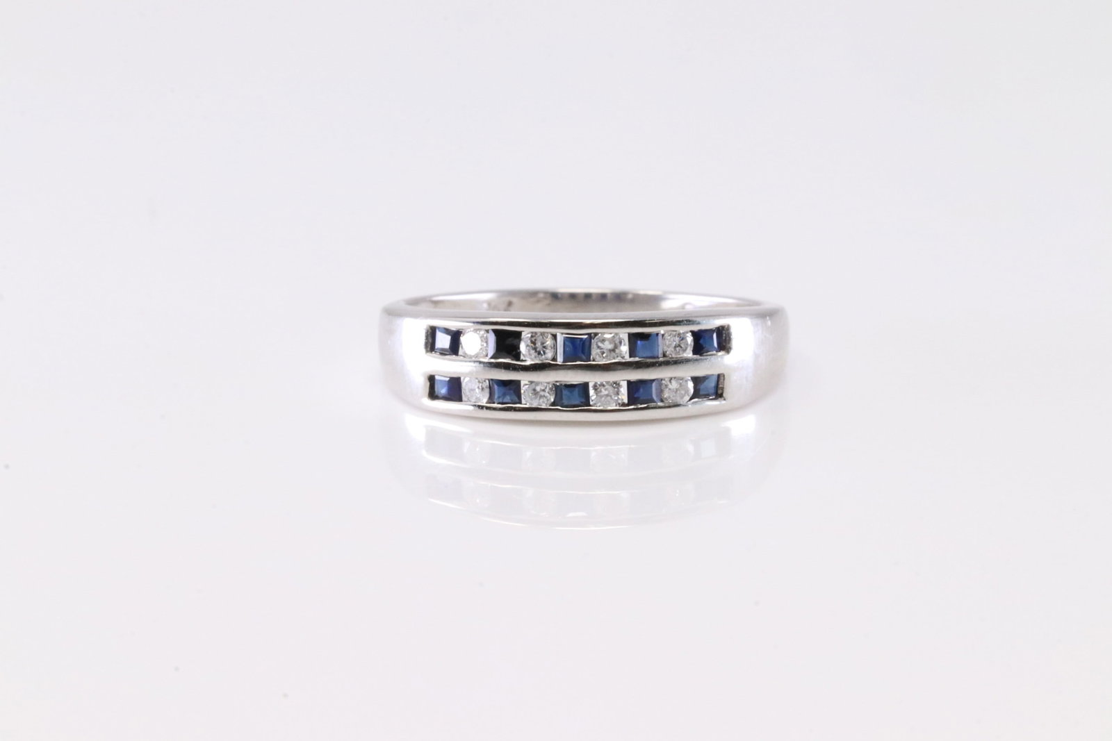Sapphire & Diamond Ring 14Kt.: Ladies 14Kt White Gold Sapphire & Diamond. This Elegant Ring has Sapphire's with Sparkling Diamonds. Ring size: 7.00. Total weight: 2.35 Grams.