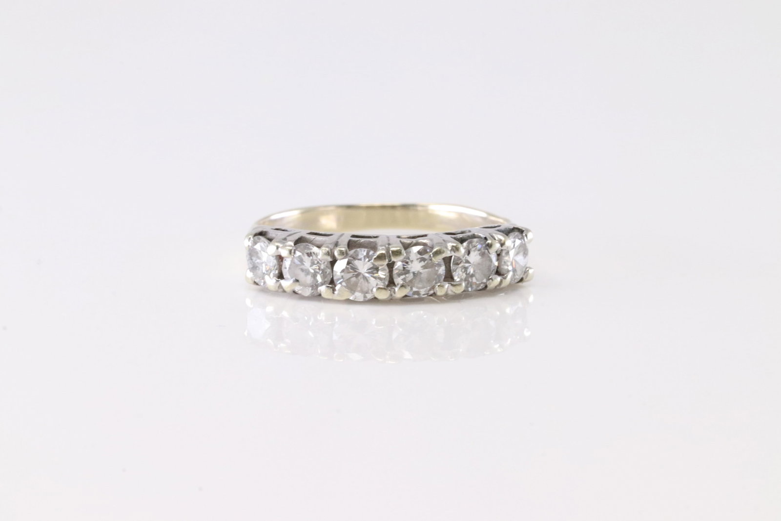 Diamond Ring 14Kt.: Ladies 14Kt White Gold Diamond Ring. This Charming Ring has 6 Round Sparkling Diamonds. Diamond Approx Weight: 0.30 ctw Ring Size: 7.00. Total Weight: 2.76 Grams.