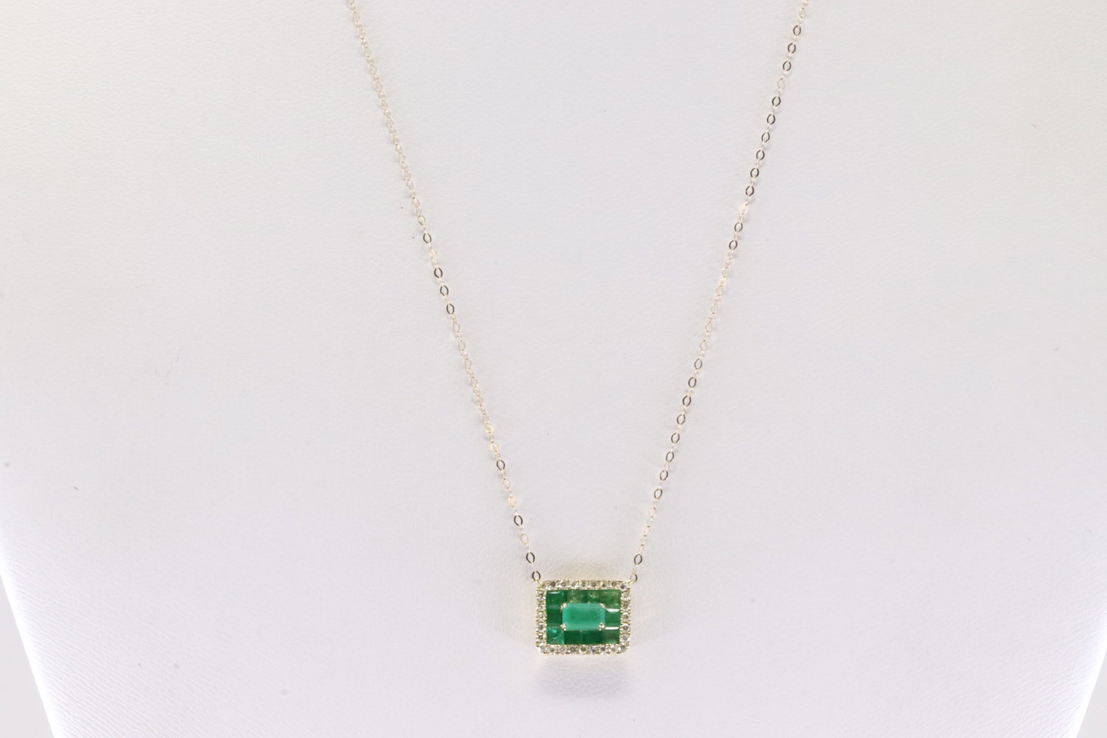 Emerald & Diamond Necklace 10Kt.: 10Kt Yellow Gold Emerald & Diamond Necklace. This Elegant Necklace has Charm with Emerald & Sparkling Diamonds. Diamonds weight: 0.18ctw. Necklace length: 18.00"