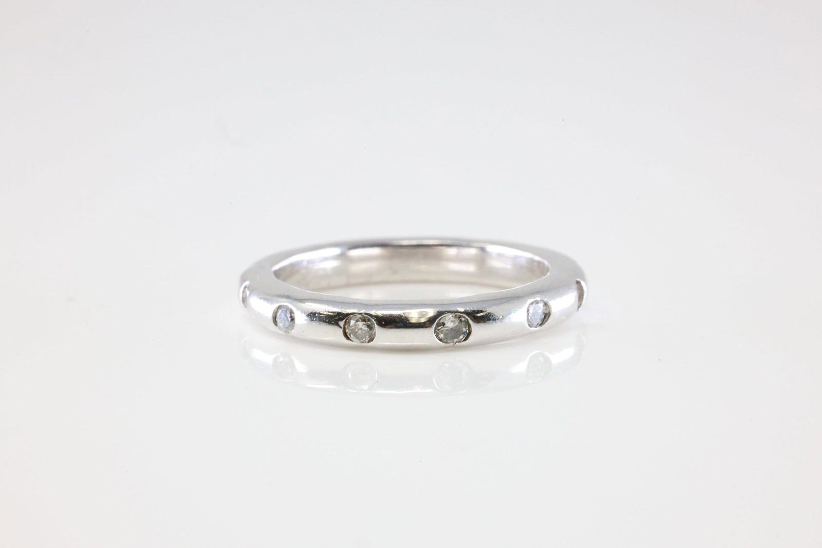 Eternity Diamond Ring 14Kt.: Ladies 14Kt White Gold Eternity Diamond Ring. This Eternity Gorgeous Ring has Sparkling Diamonds. Diamonds approx: 0.30ctw. Ring size: 6.50. Total weight: 4.21 Grams.