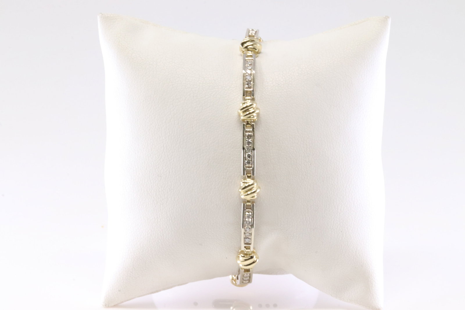 Elegant Diamond Bracelet 14Kt.: 14Kt Yellow Gold Diamond Bracelet. This Elegant Bracelet has 2 Tone Gold with 45 Brilliants Diamonds. Diamonds weight approx: 1.50CTW. Bracelet lenhgth: 8.00" Total weight: 12.90 Grams.