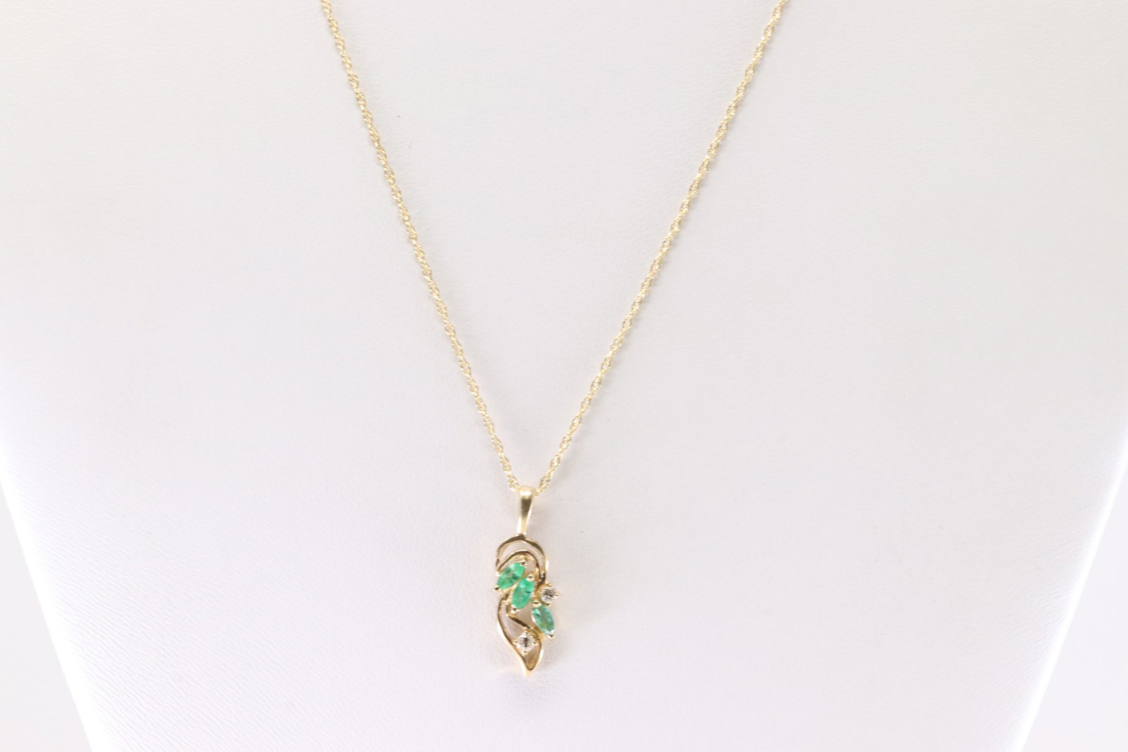Emerald & Diamond Necklace14Kt.: Ladies 14Kt Yellow Gold Emerald & Diamond Necklace. This Necklace has Gorgeous Pendant With 3 Emerald Gemstone & 2 Round Sparkling Diamonds. Necklace Length: 18.00. Total Weight: 2.17 Grams.