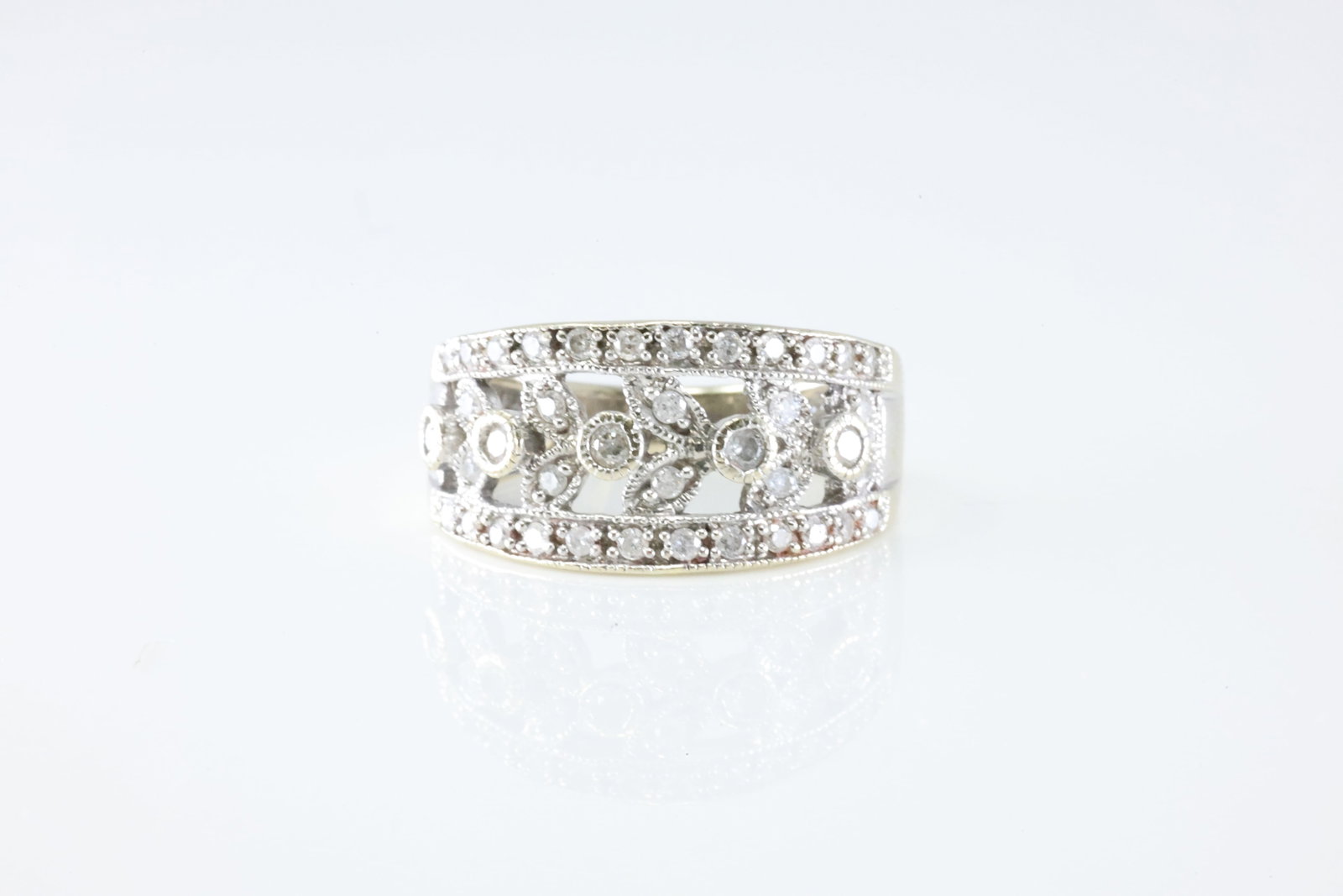 Diamond Ring 10Kt.: Ladies 10Kt White Gold Diamond Ring. This Charming Ring has 39 Round Sparkling Diamonds. Diamond Approx Weight: 0.80ctw. Ring Size: 6.00. Total Weight: 5.12 Grams.