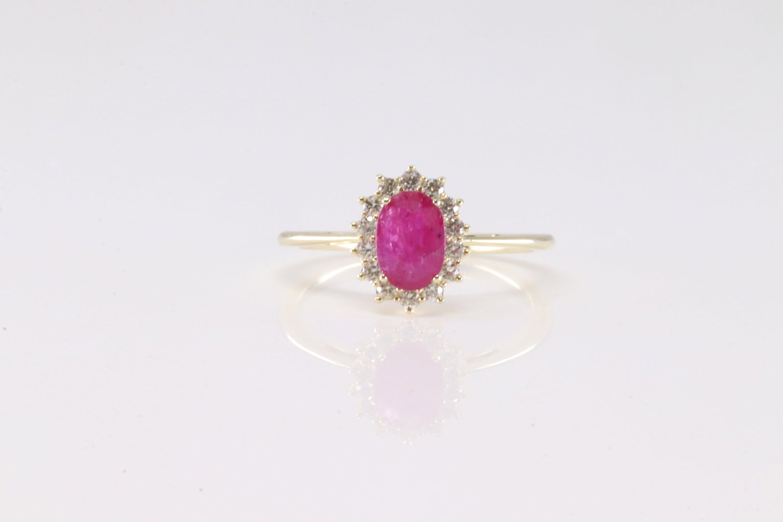 Ruby & Diamond Ring 10Kt.: Ladies 10Kt Yellow Gold Ruby & Diamond Ring. This Charming Ring has Ruby Surrender By Sparkling Diamonds. Diamonds weight: 0.25ctw. Ring size: 6.25.