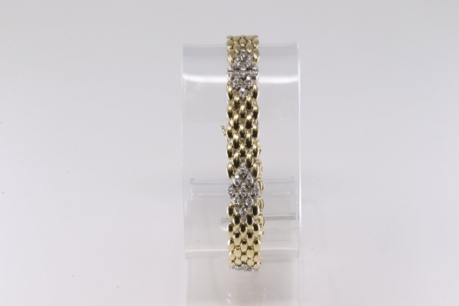 Diamond Bracelet 14Kt.: 14Kt Yellow Gold Diamond Bracelet. This Elegant Bracelet has 2 Tones Gold with 54 Sparkling Diamonds. Diamonds weight approx: Bracelet length: 8.00" Total weight: 24.86 Grams.