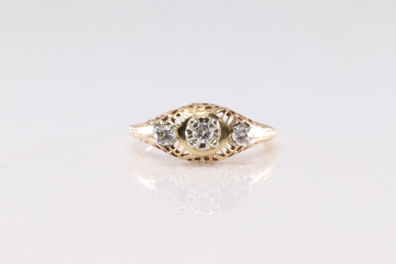 Diamond Ring 10Kt.: Ladies 10Kt Yellow Gold Diamond Ring. This Charming Ring has 3 Sparkling Diamonds. Diamonds weight approx: Ring size: 5.75. Total weight: 2.30 Grams.