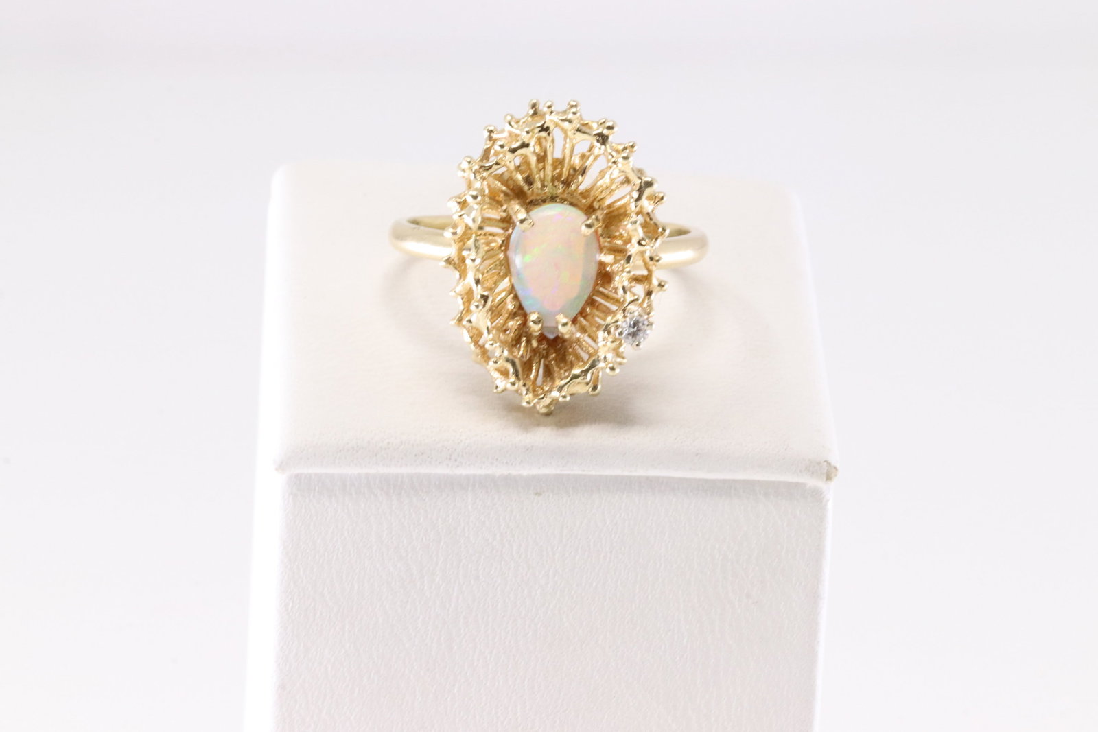 Opal & Diamond Ring 14Kt.: Ladies 14Kt Yellow Gold Opal & Diamond Ring. This Gorgeous Ring has Pear Design Opal Gemstone With Solitaire Diamond. Ring Size: 10.00. Total Weight: 5.35 Grams.