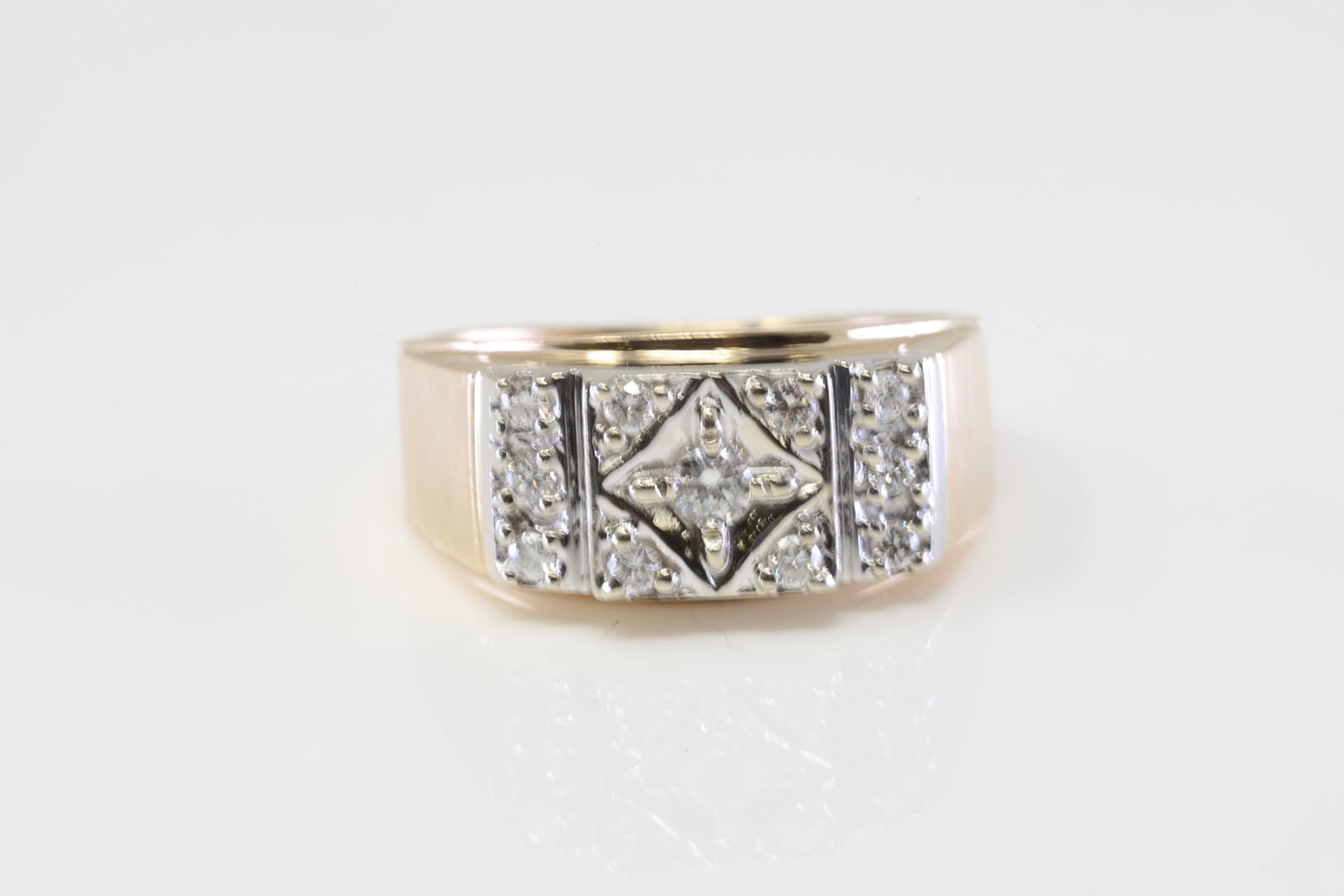 Diamond Ring 14Kt.: 14Kt Yellow Gold Diamond Ring. Ring has 11 round Diamonds. Diamonds weight approx: 0.50ctw. Ring size: 12.00. Total weight: 9.10 Grams.