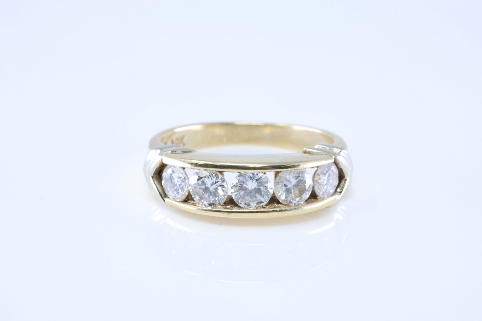 Diamond Band Ring 14Kt.: Ladies 14Kt Yellow Gold Diamond Ring. This Beautiful Ring has 5 Brilliants Diamonds. Diamonds weight approx: 1.00ctw.