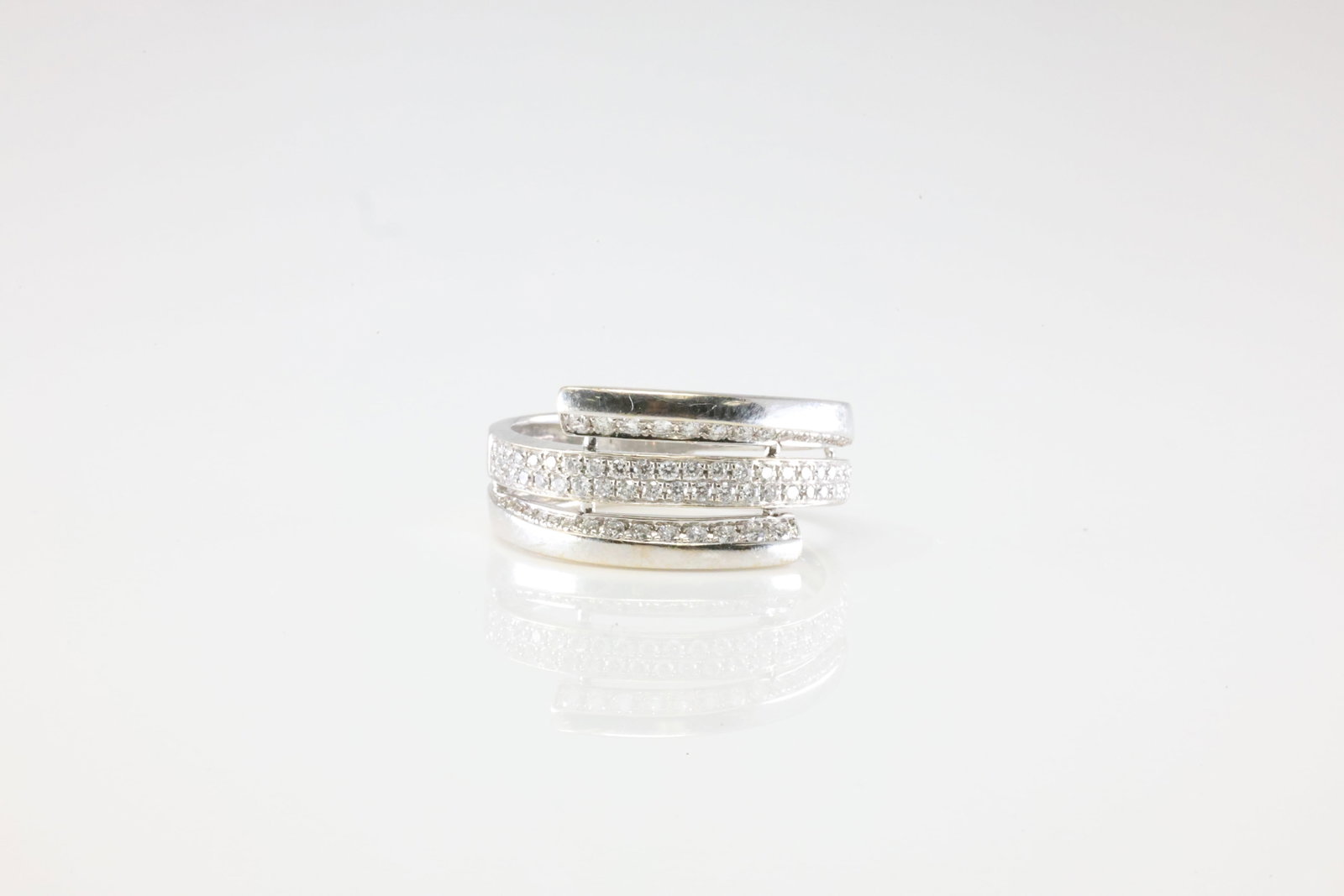 Diamond Ring 14Kt.: Ladies 14Kt White Gold Diamond Ring. This Charming Ring has 76 Round Sparkling Diamonds. Diamond Approx Weight: 0.50ctw. Ring Size: 7.50. Total Weight: 4.96 Grams.