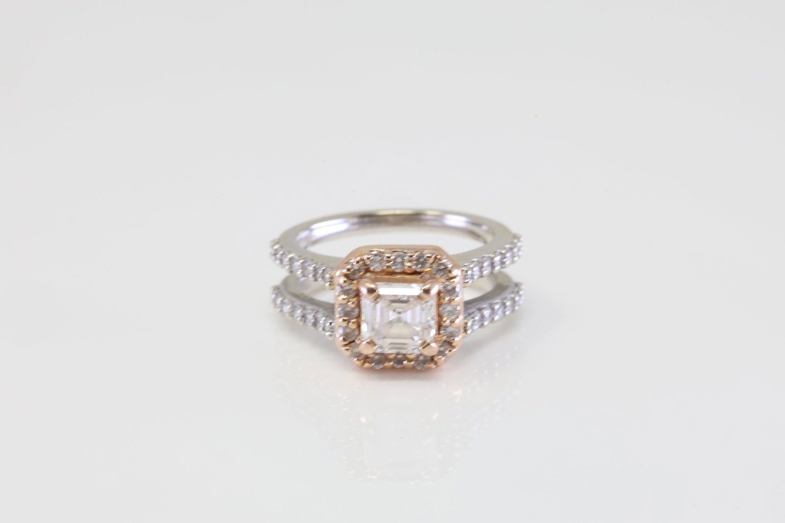 Wedding Diamond Ring 14Kt.: Ladies 14Kt White Gold Wedding Diamond Ring. This exquisite diamond ring features a stunning square-cut center diamond, elegantly framed by a halo of smaller diamonds. The double band design adds an