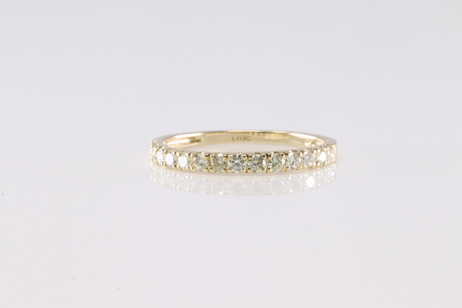 Diamond Ring 10Kt.: 10Kt Yellow Gold Diamond Ring. This Charming Ring has 14 Sparkling Diamonds. Diamonds weight: 0.45ctw. Ring size: 7.00.