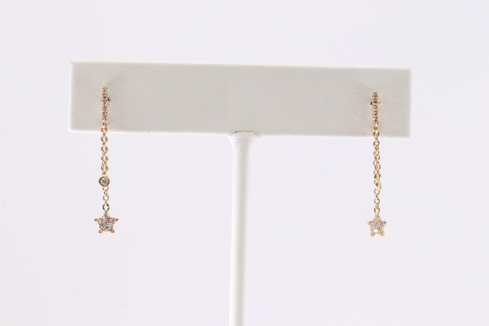 Diamond Stud Drop Earring 18Kt.: Ladies 18Kt Yellow Gold Diamond Stud Drop Earring. This Earring has A Delicate Chain Hangs From The Stud With Star Design & 34 Round Sparkling Diamonds.