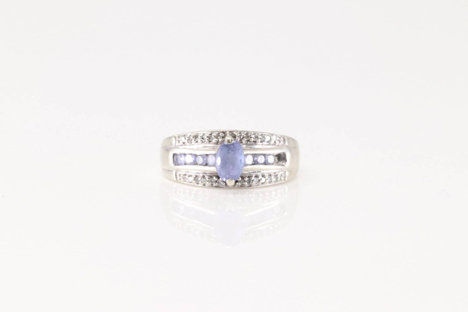 Amethyst & Diamond Ring 10Kt.: Ladies 10Kt White Gold Amethyst & Diamond Ring. This Charming Ring has Amethyst Gemstone with 24 Sparkling Diamonds. Ring size: 6.50. Total weight: 3.10 Grams.