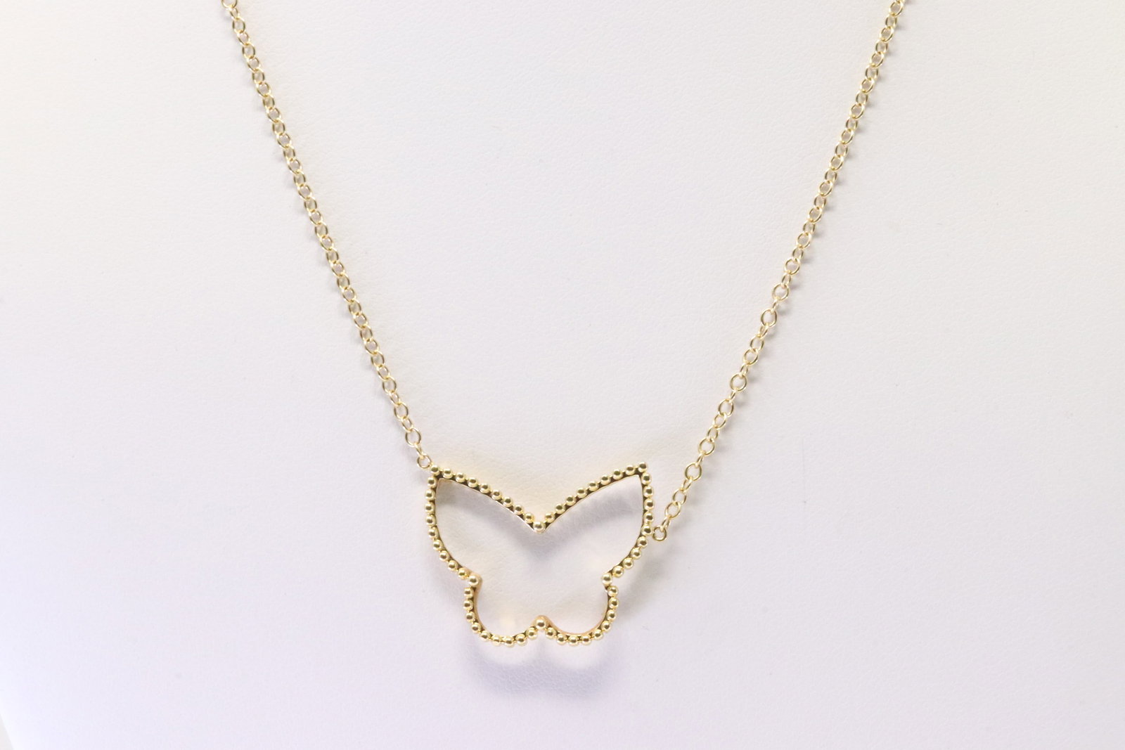 Butterfly Pendant / Necklace 18Kt.: Ladies 18Kt Yellow Gold Butterfly Pendant / Necklace. Necklace has A Butterfly design Pendant. Necklace length: 16.00" Total weight: 6.00 Grams.