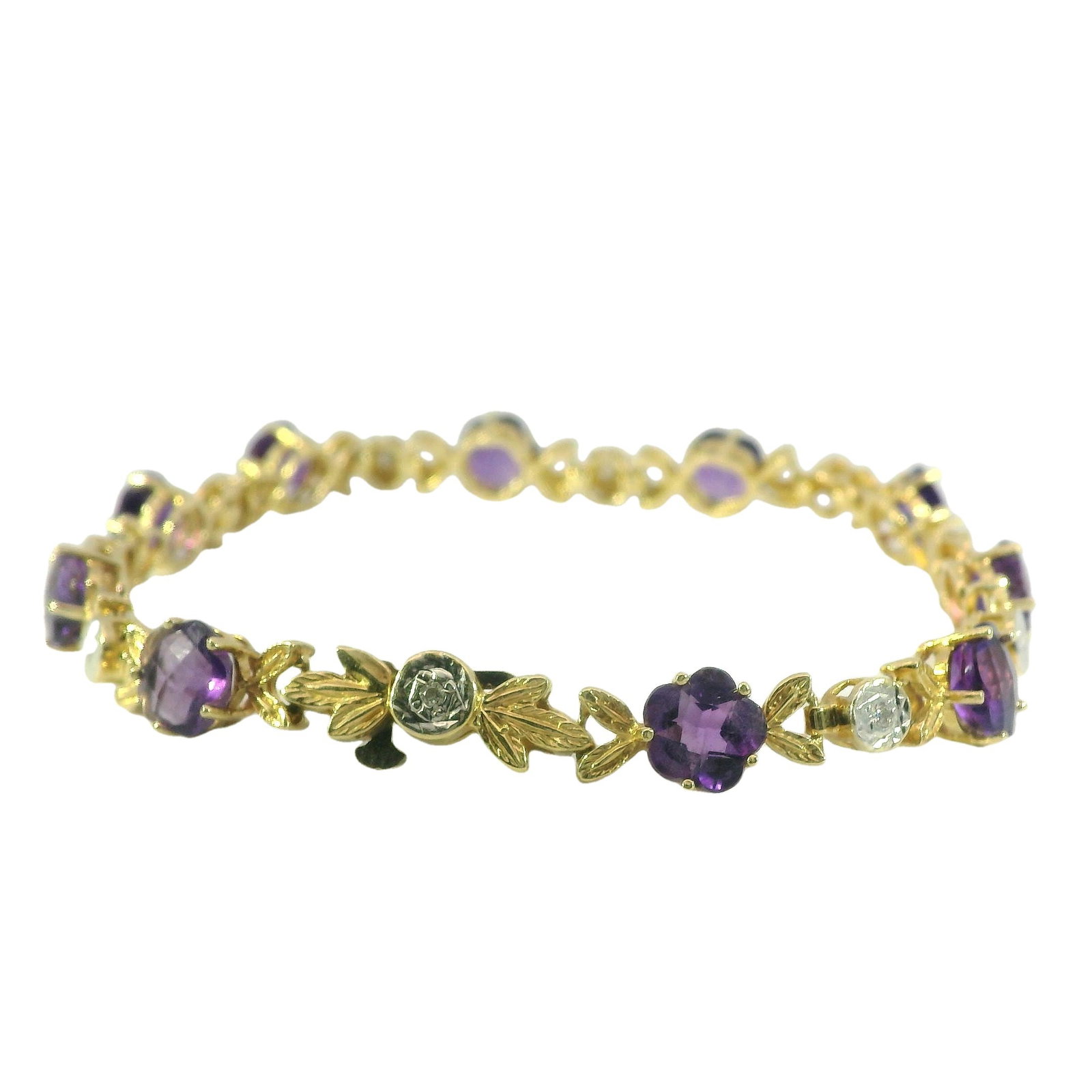 Amethys & Diamond Bracelet 14Kt: 14Kt Yellow Gold Amethyst & Diamond Bracelet. This exquisite bracelet features a stunning combination of deep purple amethysts and shimmering gold links with accent diamonds. Each gemstone is