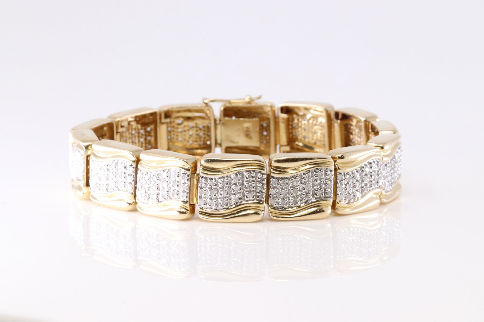 Diamond Bracelet 14Kt.: 14Kt Yellow Gold Diamond Bracelet. This Elegant Bracelet has 252 Round Sparkling Diamonds. Diamond Approx Weight: 5.00-6.00cttw. Bracelet Length: 14.00. Total Weight: 36.73. Grams.