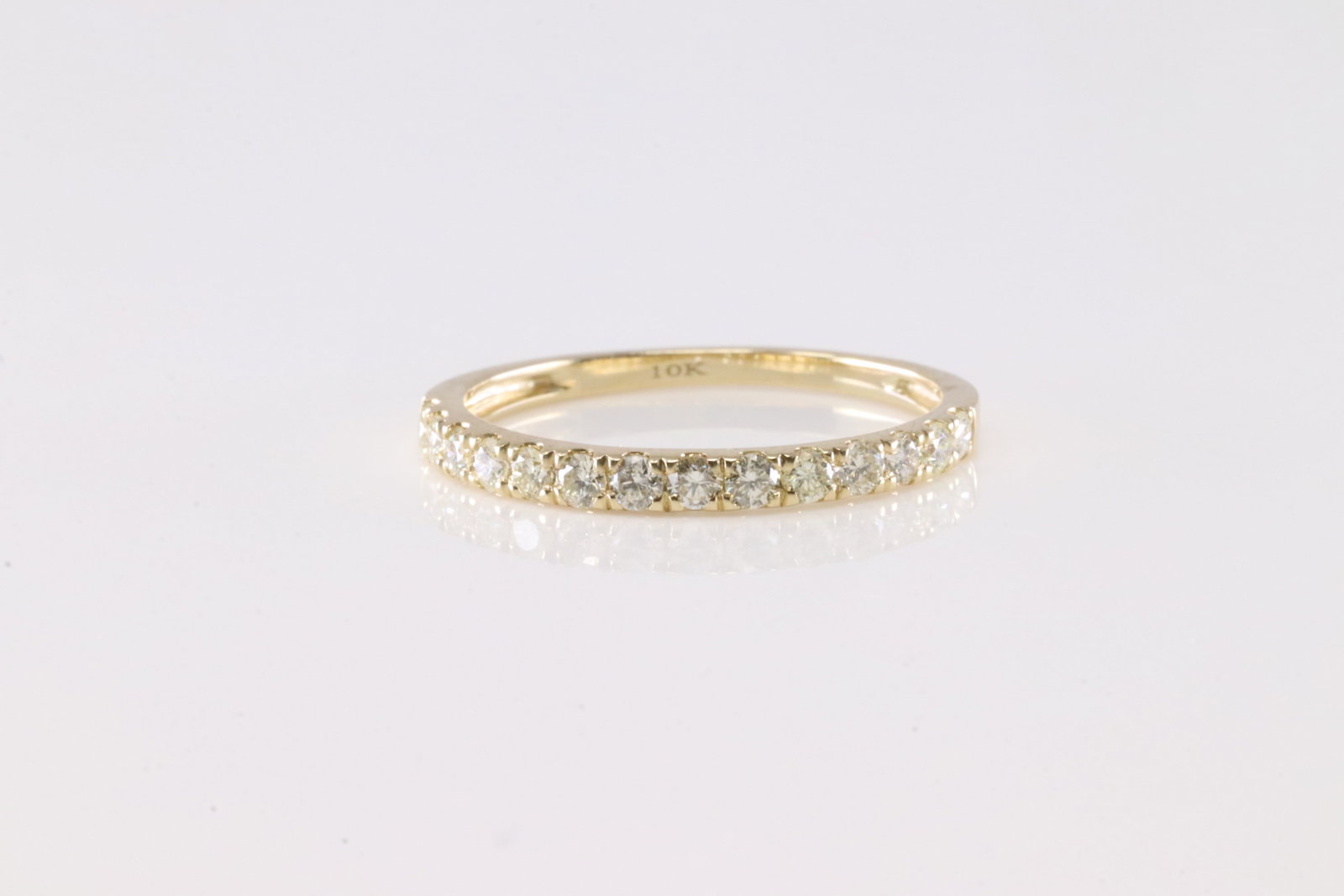 Dimaond Ring 10Kt.: 10Kt Yellow Gold Diamond Ring. This Charming Ring has 14 Sparkling Diamonds. Diamonds weight: 0.45ctw. Ring size: 7.00.